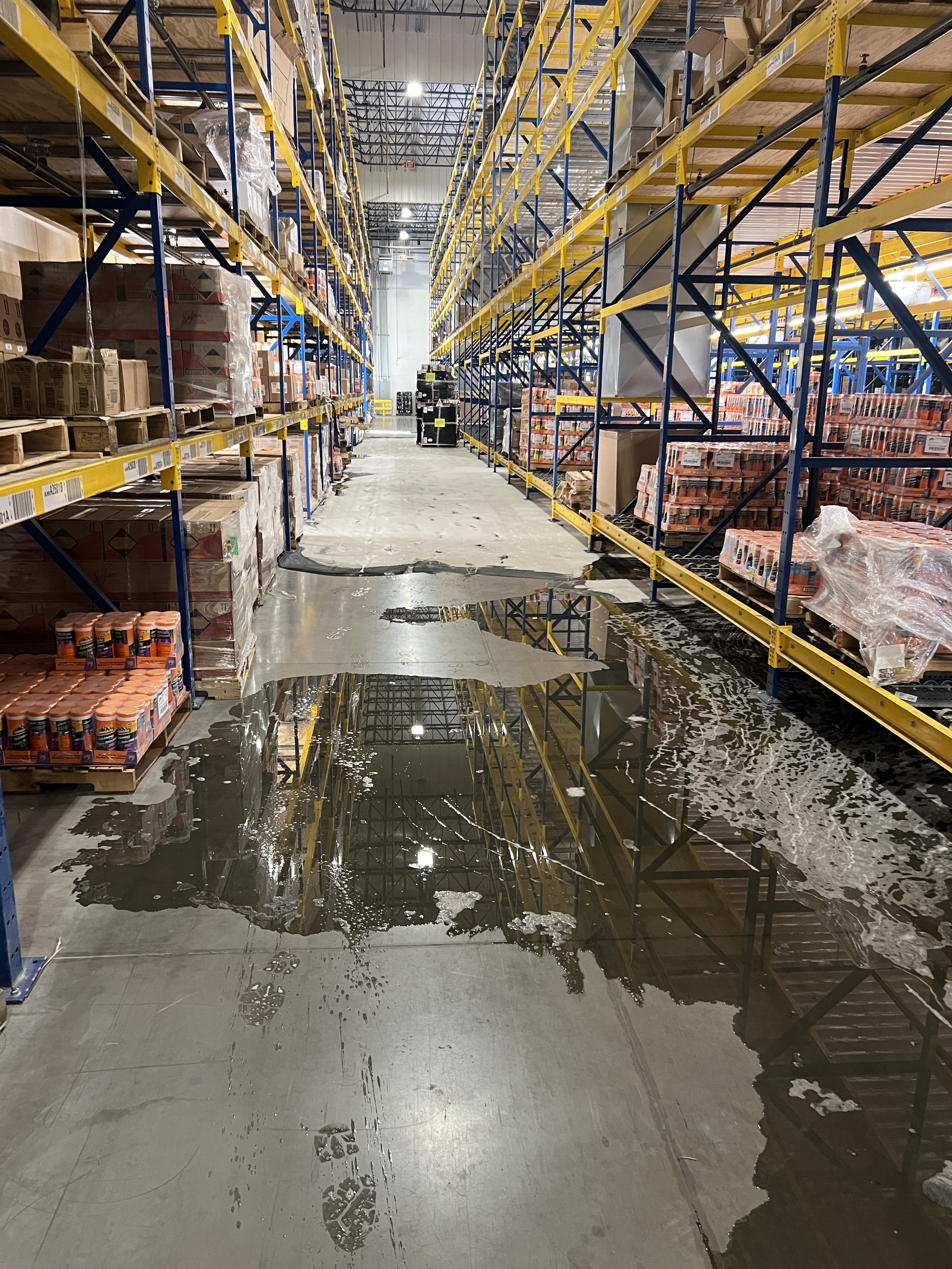Industrial warehouse clean up of AFFF firefighting foam from an accidental sprinkler strike.
