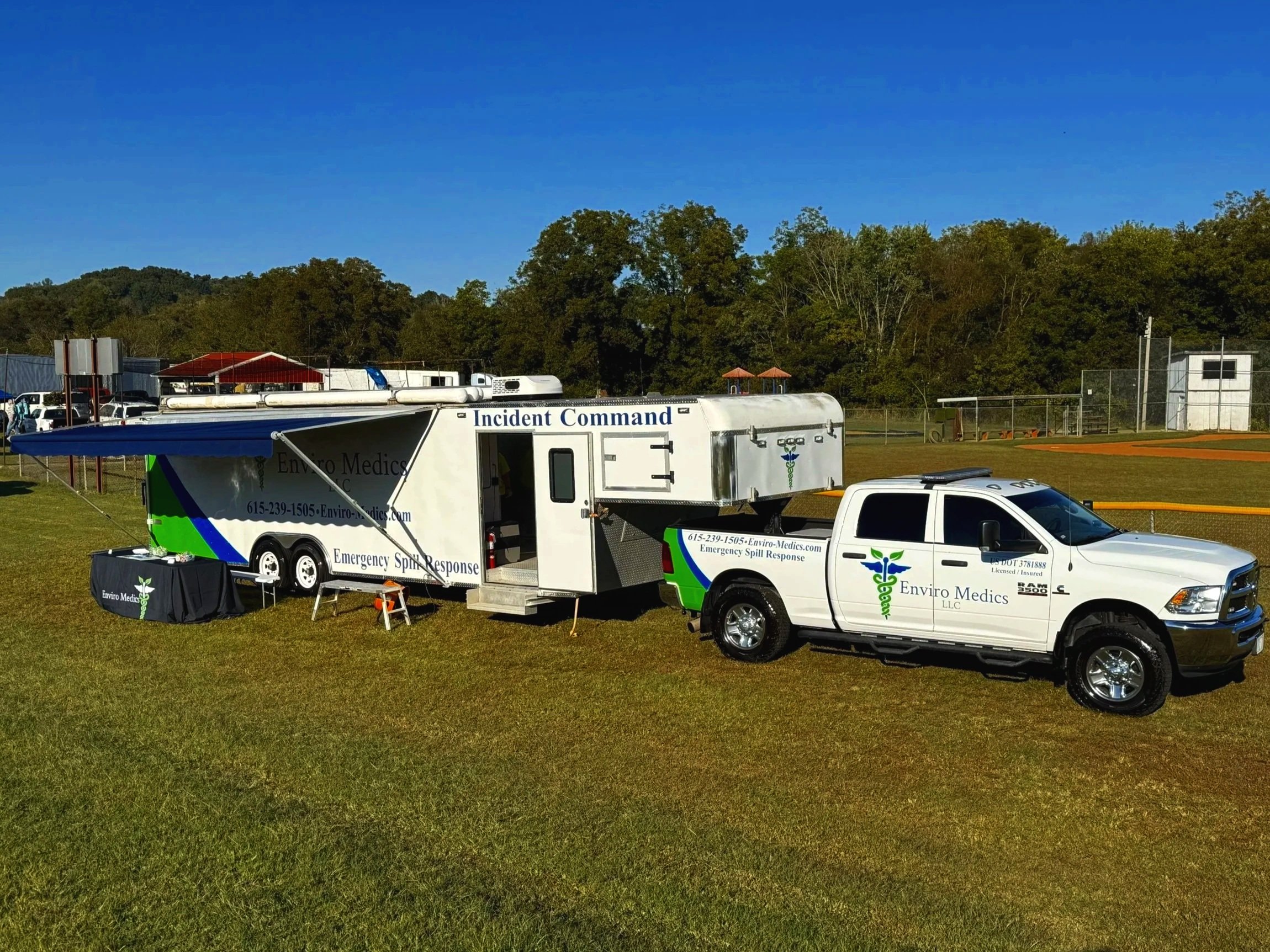 Enviro Medics LLC incident command trailer and emergency spill response vehicles deployed for hazardous materials operations in Athens, Alabama.