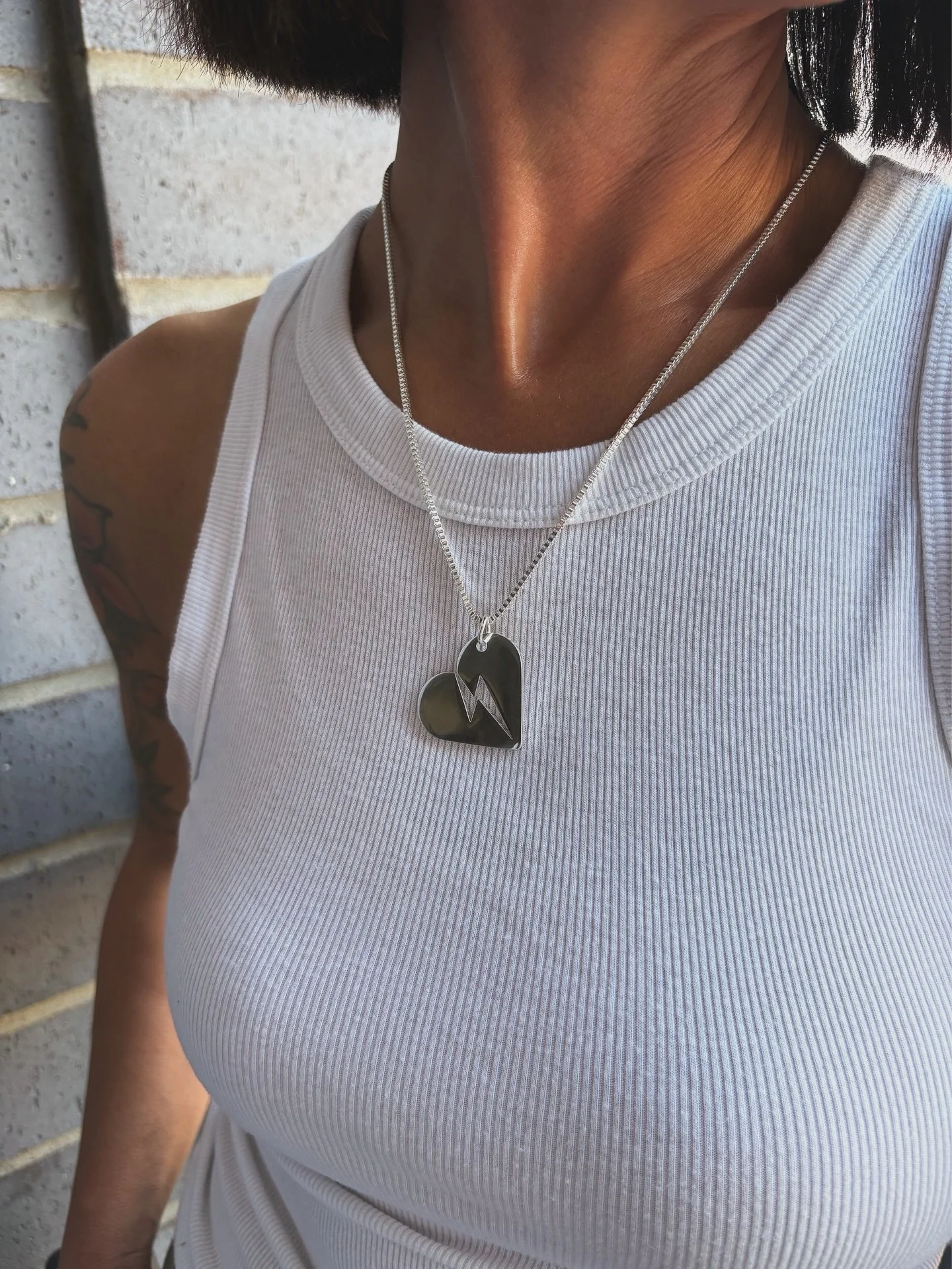 Right where it belongs&mdash;over her heart. ⚡️💖

The Powerheart Necklace is a symbol of strength, love, and the electric force of women who rock.

This Valentine&rsquo;s Day, give her a gift she&rsquo;ll wear every day and feel good about.

A porti