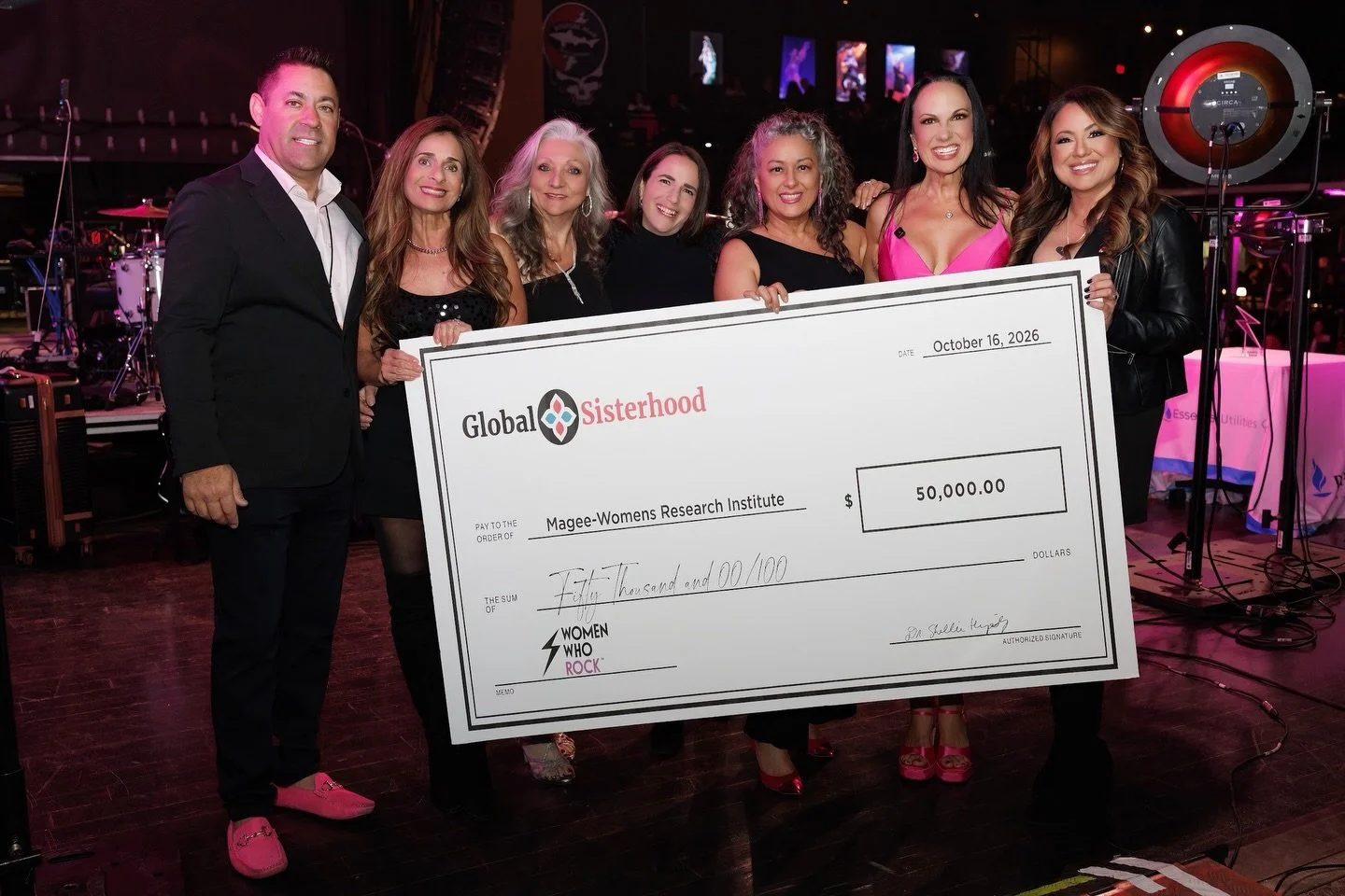 When women step forward together, lives change. 💗⚡️

One of the most powerful moments of our 2026 Women Who Rock Benefit Concert was welcoming @dr.shellie and the Global Sisterhood to the stage as they presented an extraordinary $50,000 donation in 