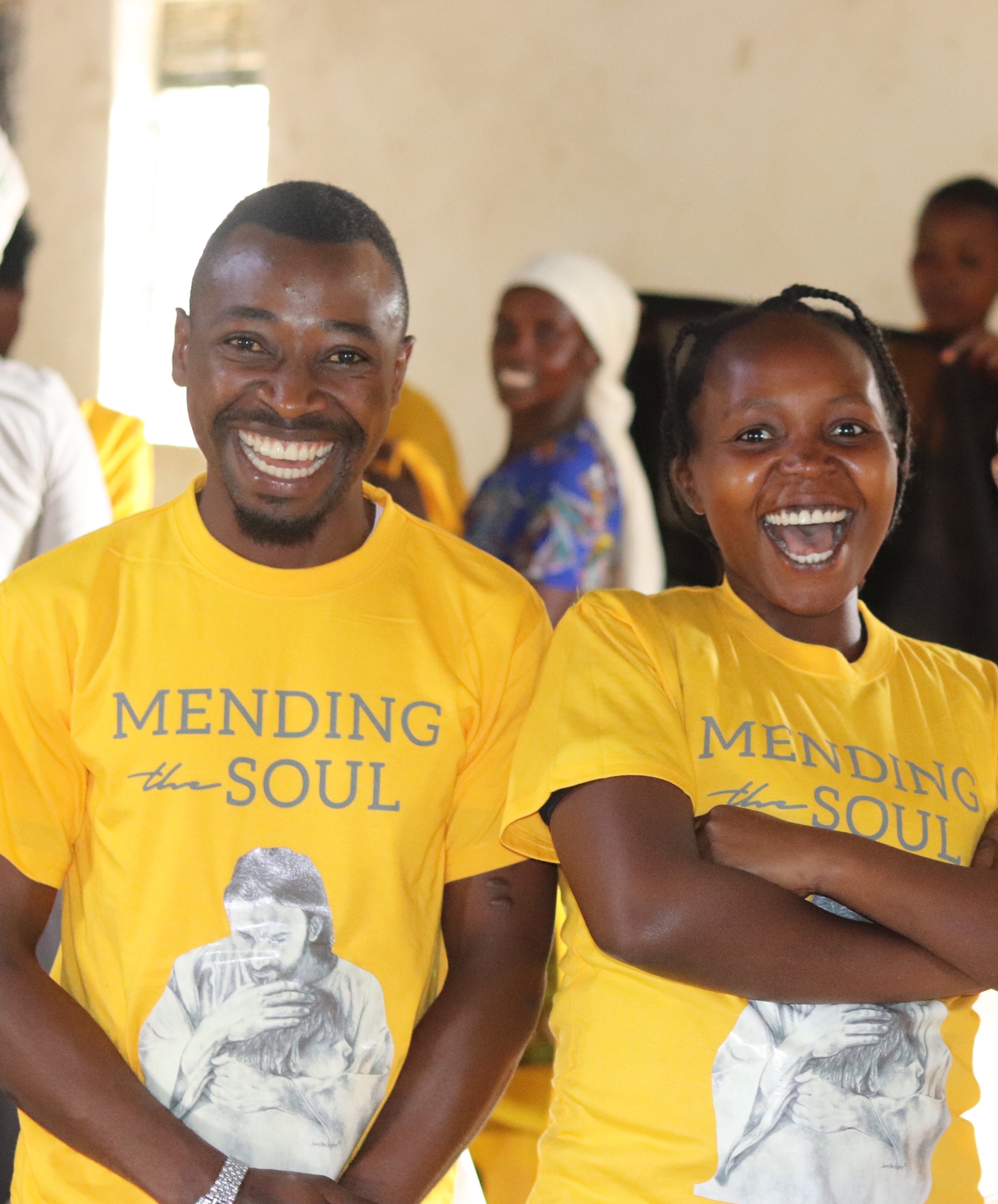 Participants pose for a photo wearing MTS t-shirts.JPG
