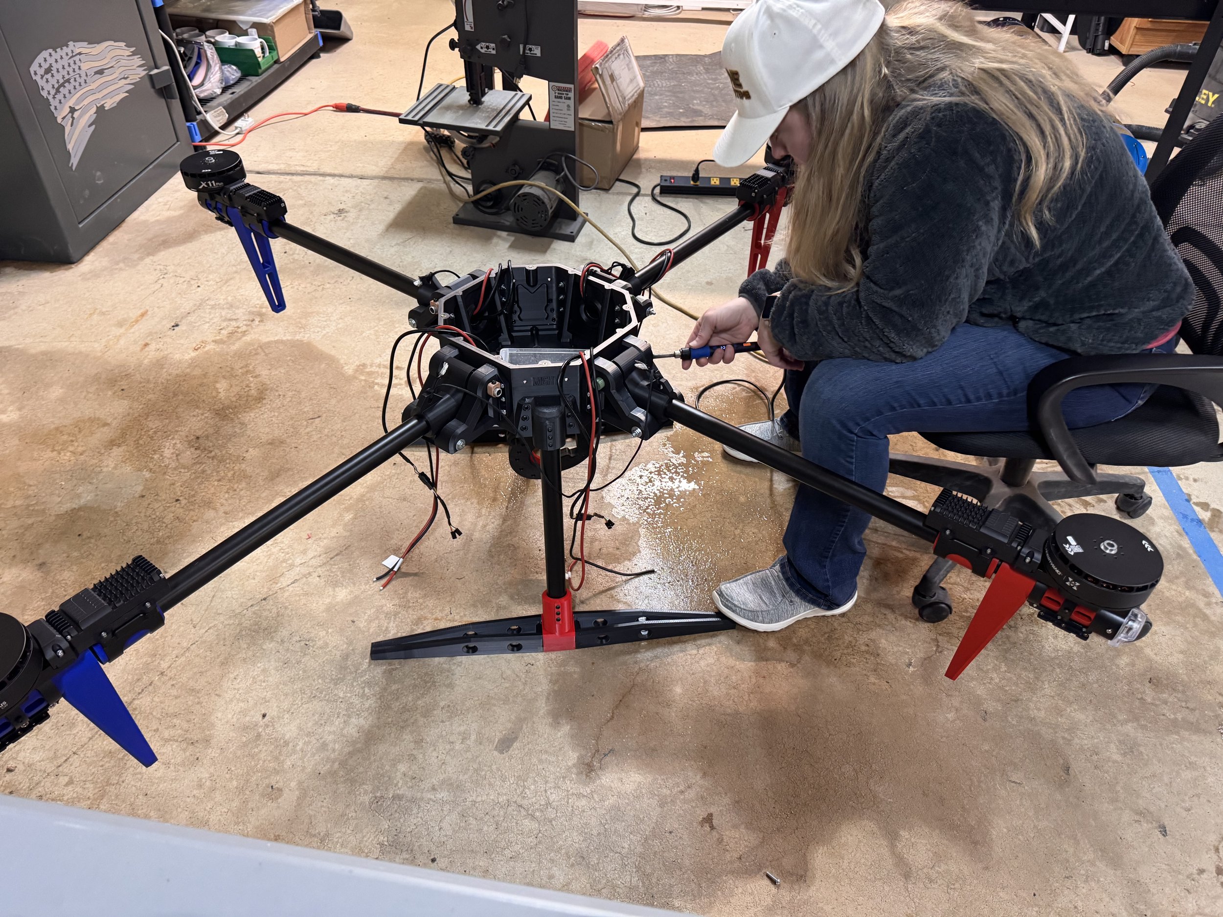 Alpine Combat System Heavy Lift Drone Concept  Amanda Barron assembling drone.jpeg