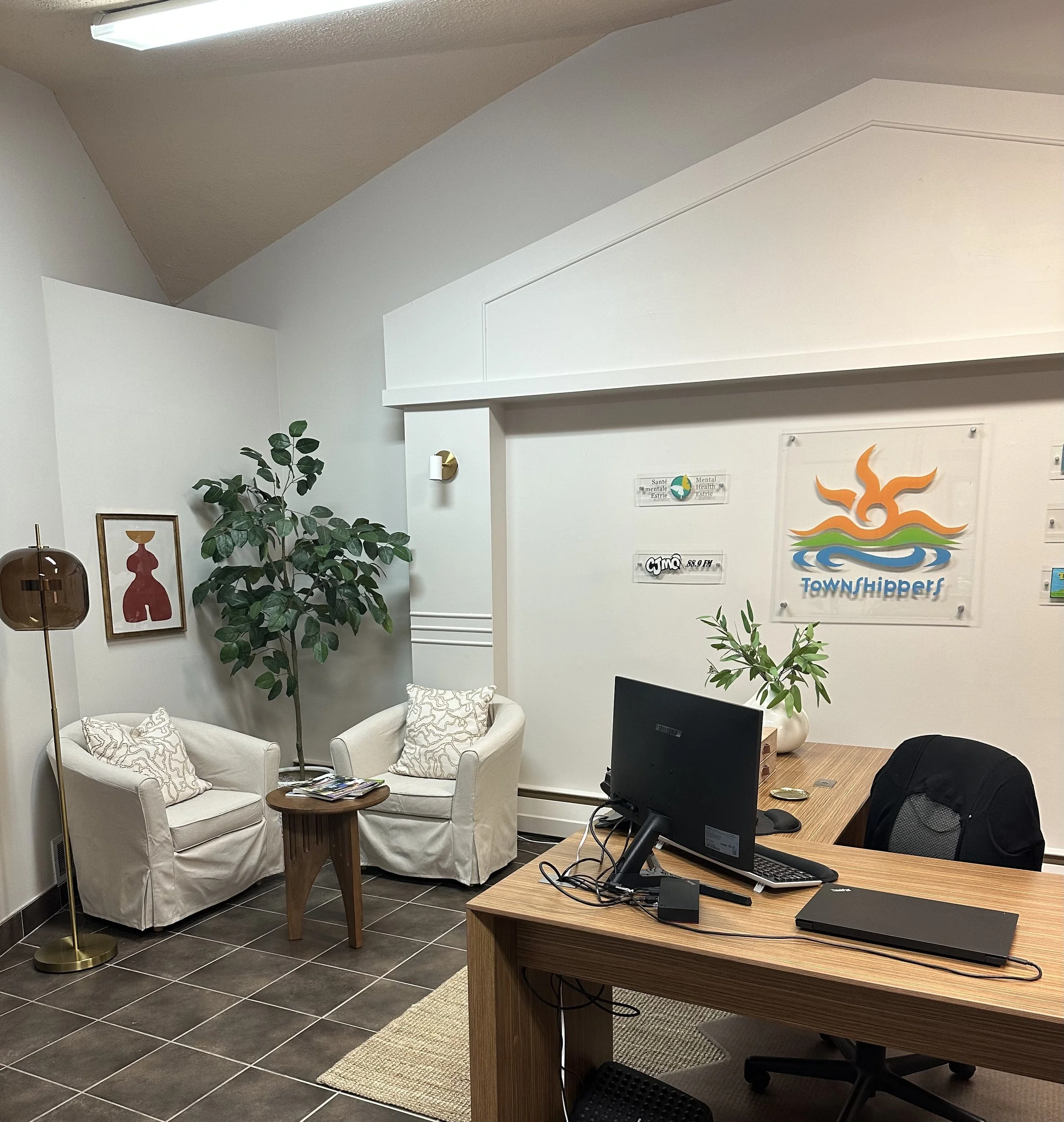 AFTER - Reception.  Can you believe we found this beautiful Artopex desk for $200 on Marketplace?