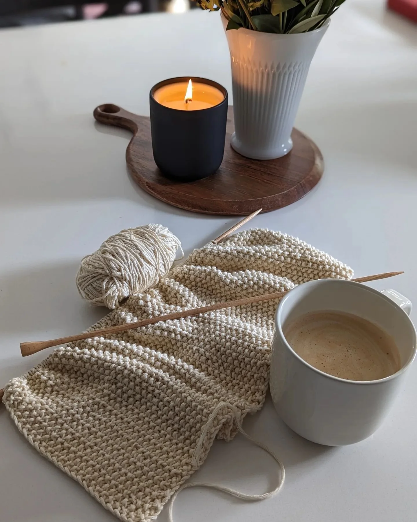 Friday afternoon focus...my current #wip, and a much-needed caffeine boost.

Knitting project is the Dragonfly Blanket from #weareknitters and is intended for one very special person.

The candle scent I am enjoying today is Grey.  This is the most l