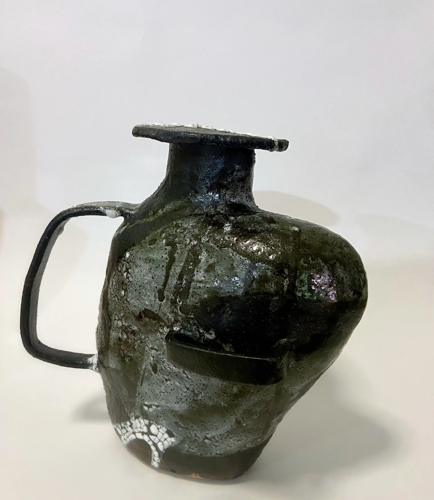 Uniquely shaped vase with handles — beKA ceramics