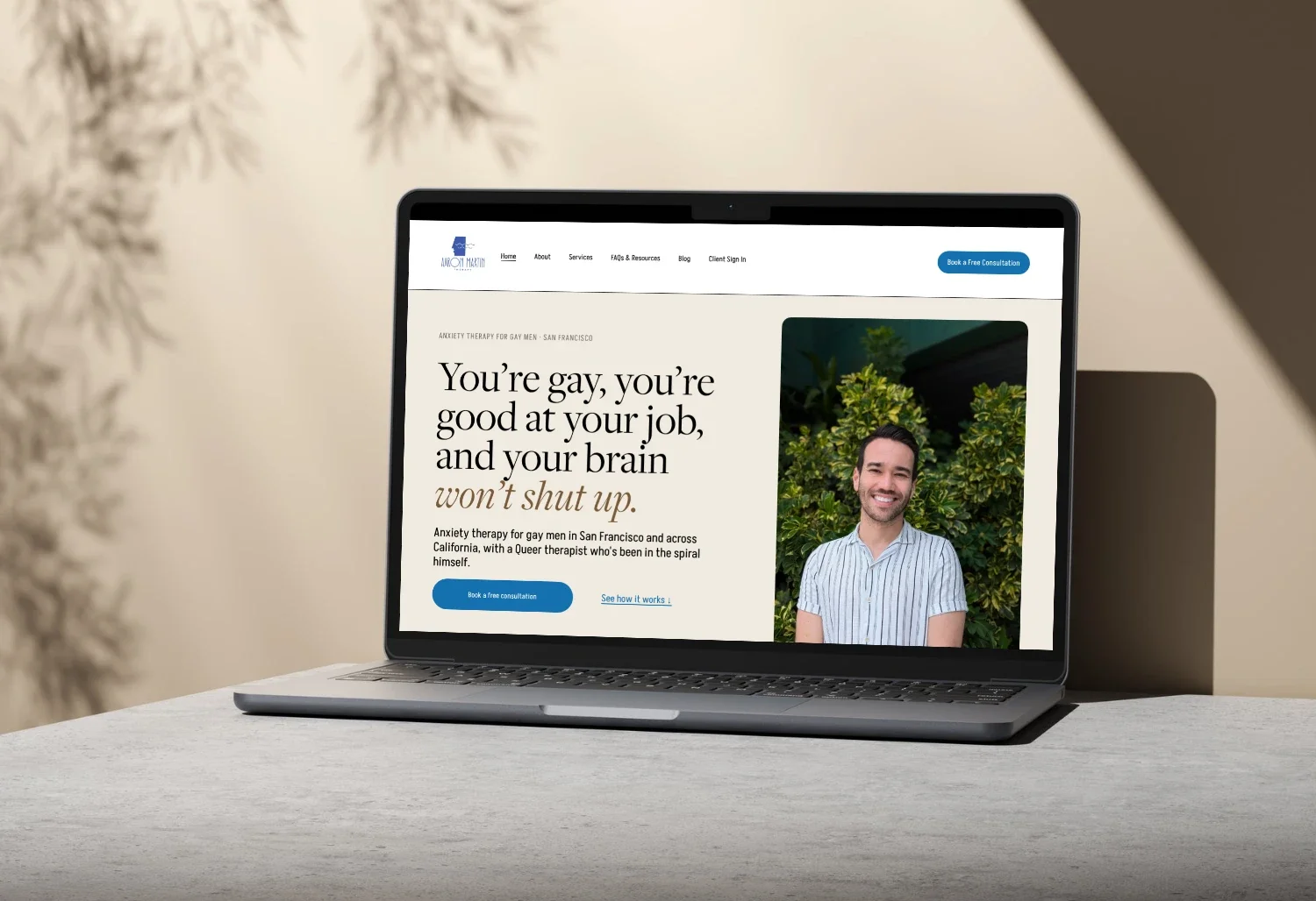 Aaron Martin Therapy homepage redesign by WeGo! shown on a laptop
