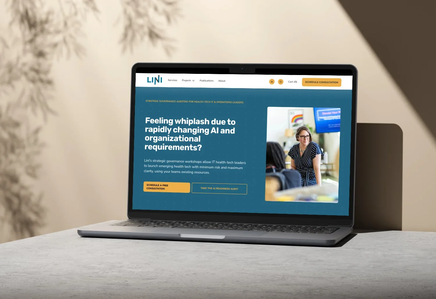 Lini LLC homepage on a laptop: strategic governance workshops for health tech IT and operations leaders