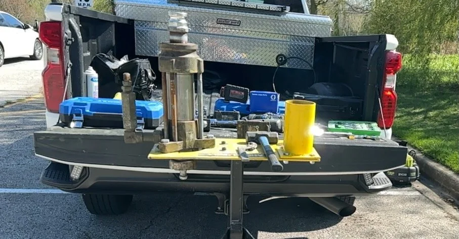 PumpLocked Platform supporting Graco displacement pump while attached on 2" pick up hitch
