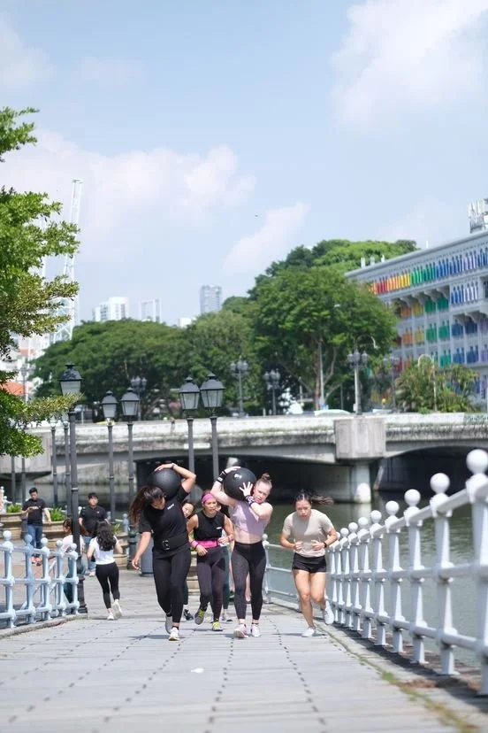 participants doing the 400m dball carry