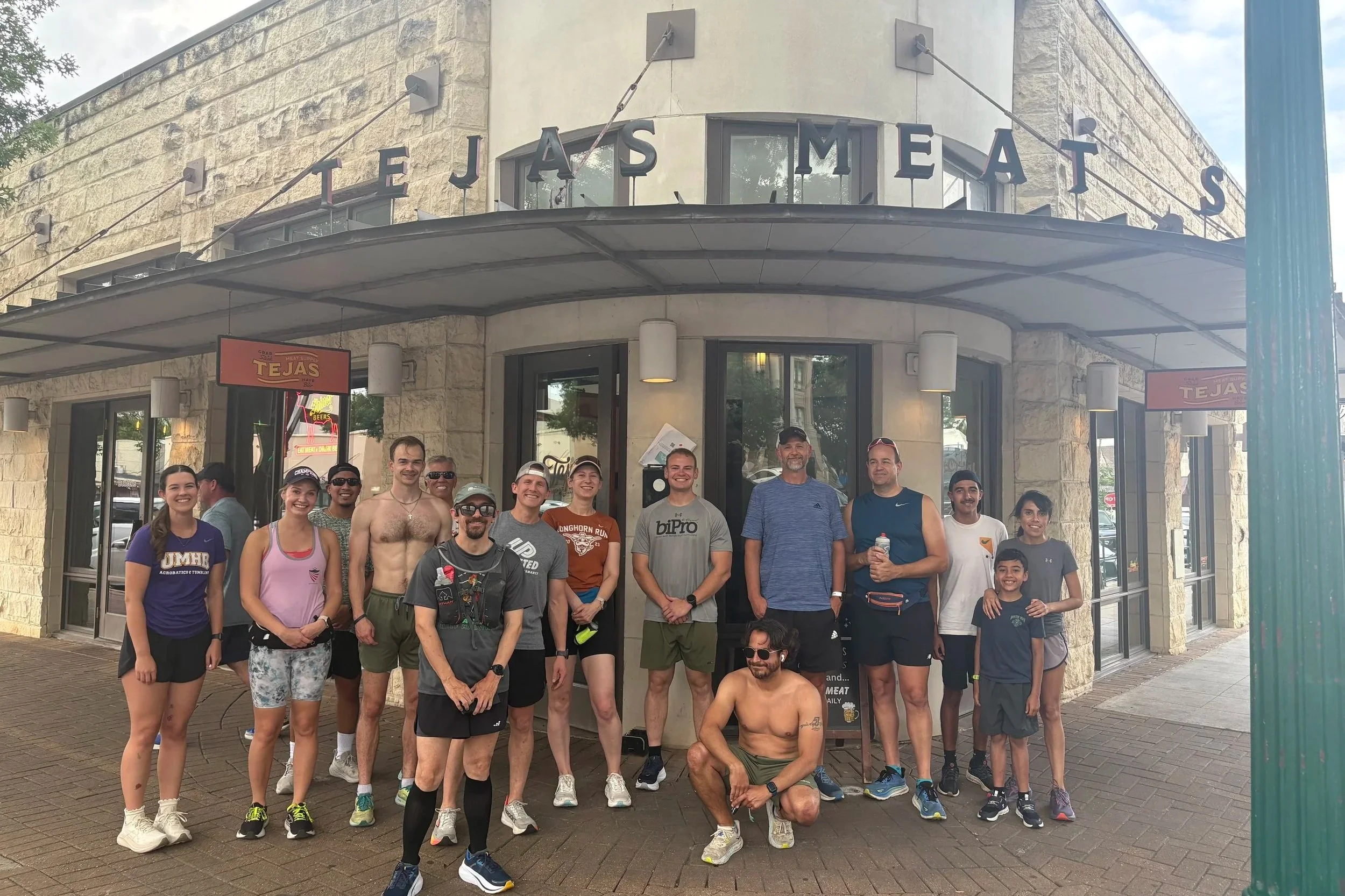 Run Uplifted, Georgetown, TX running club group picture in front of Tejas Meat Supply