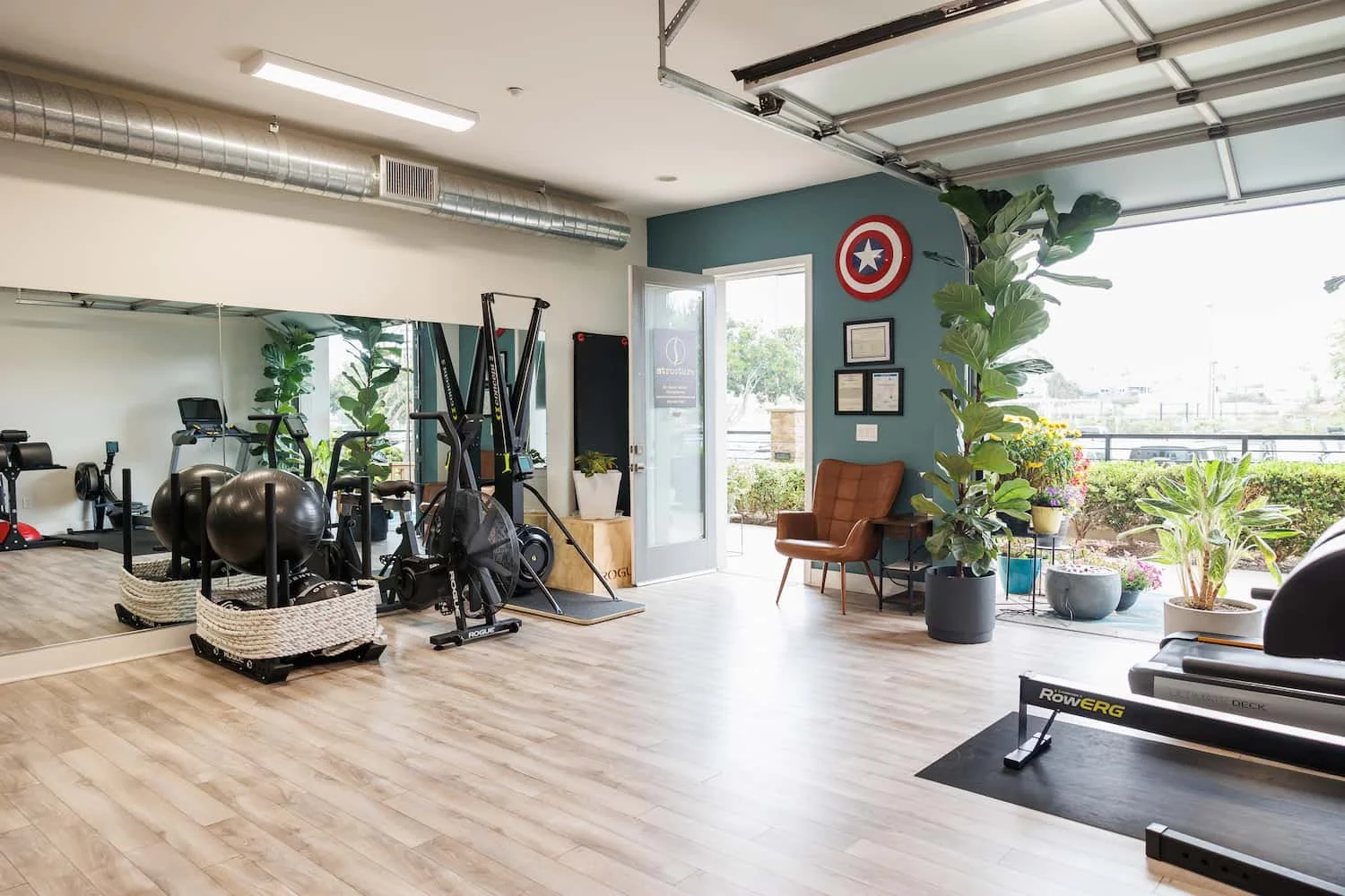 Private chiropractic gym with Hyrox equipment at Structure Chiropractic Carlsbad CA