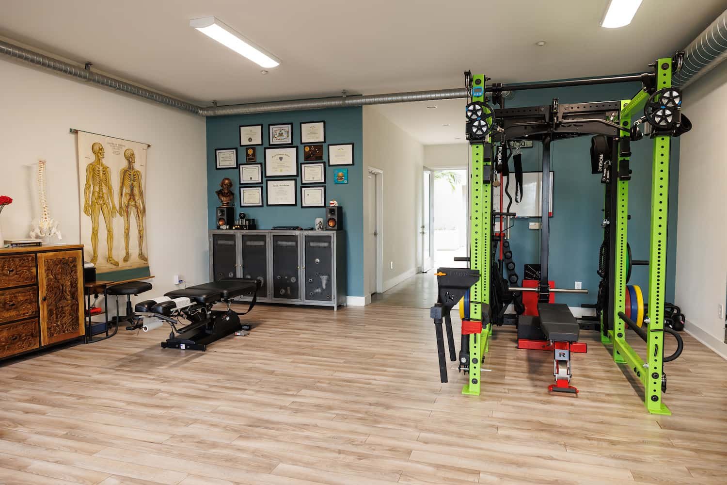 Full gym and chiropractic rehab equipment at Structure Chiropractic Carlsbad CA