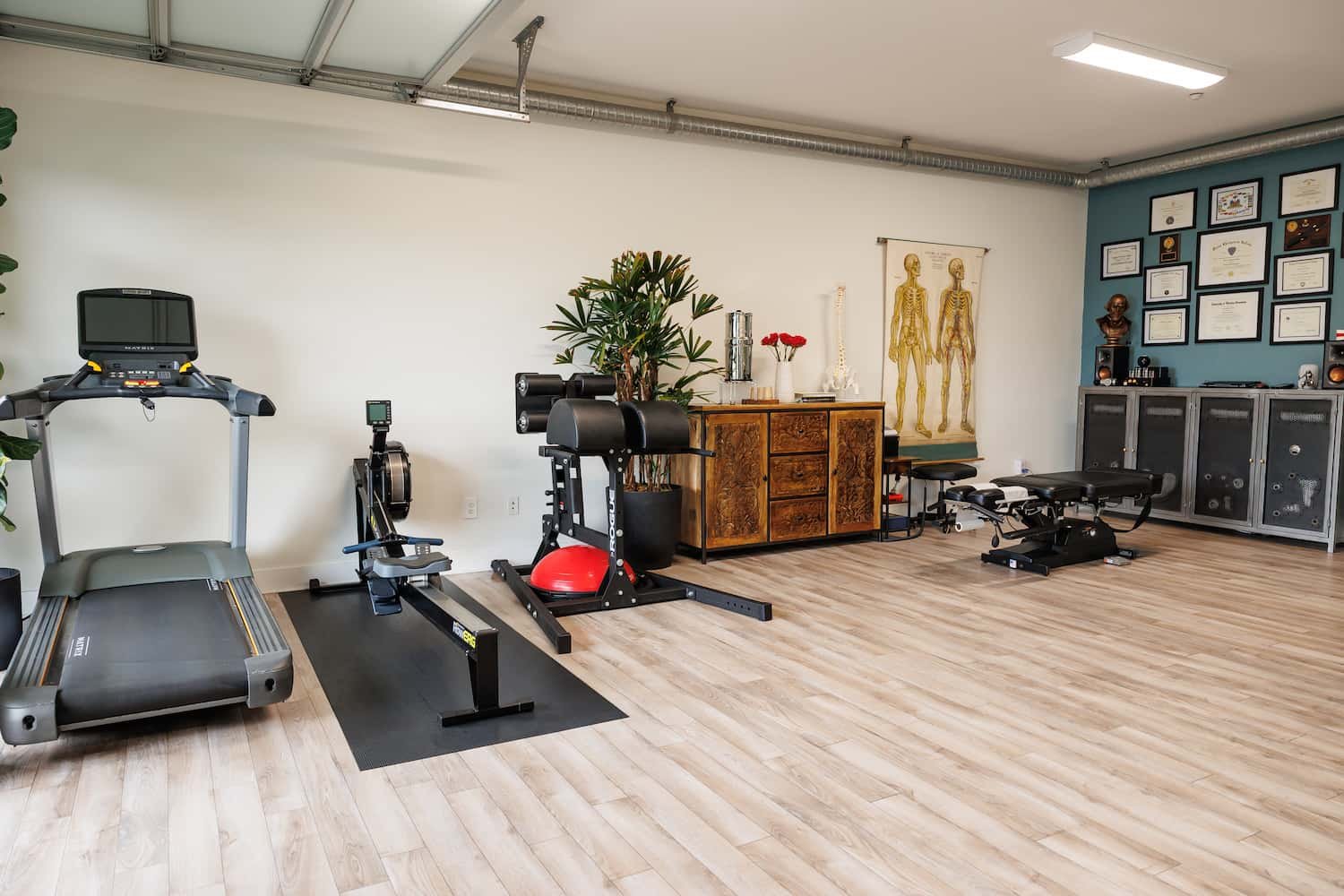 Chiropractic clinic with treadmill and rowing machine at Structure Chiropractic Carlsbad CA