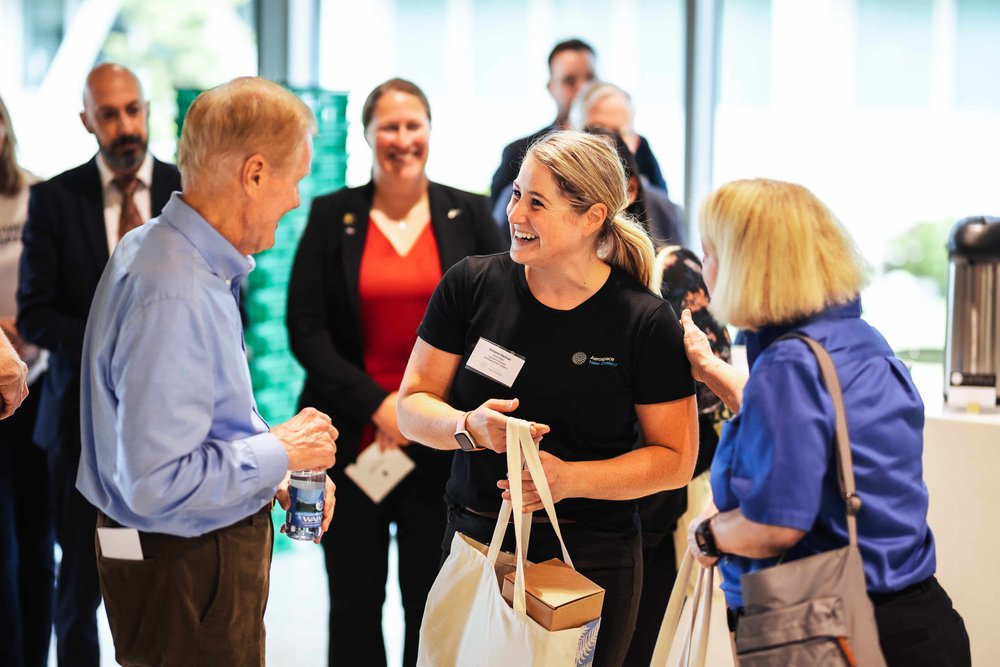   Aerospace New Zealand Operations Manager Vickie Harman with NASA Administrator Bill Nelson and NASA Deputy Administrator Pamela Melroy.  