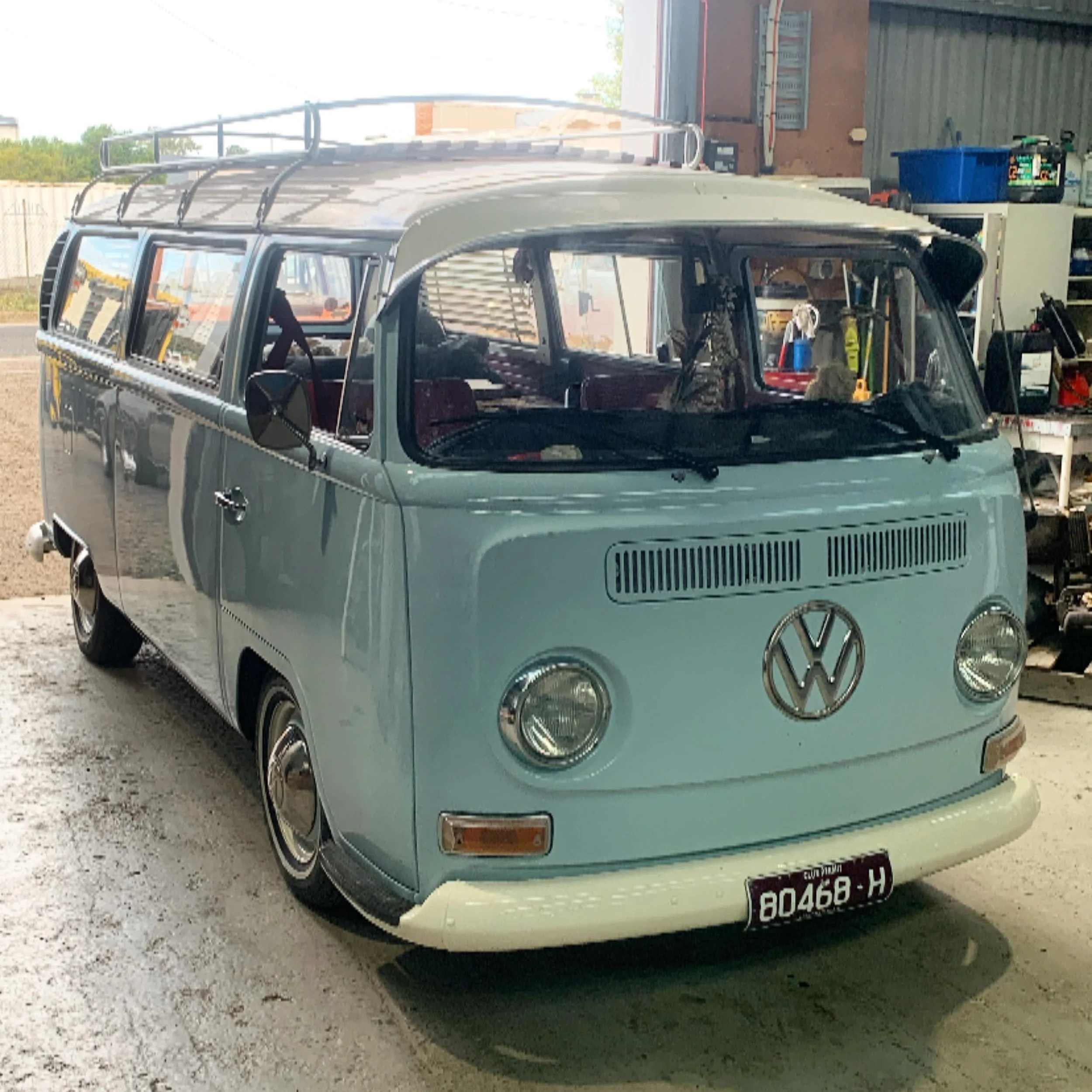 Light blue and white Volkswagen early bay kombi in the Fresh Kustoms workshop