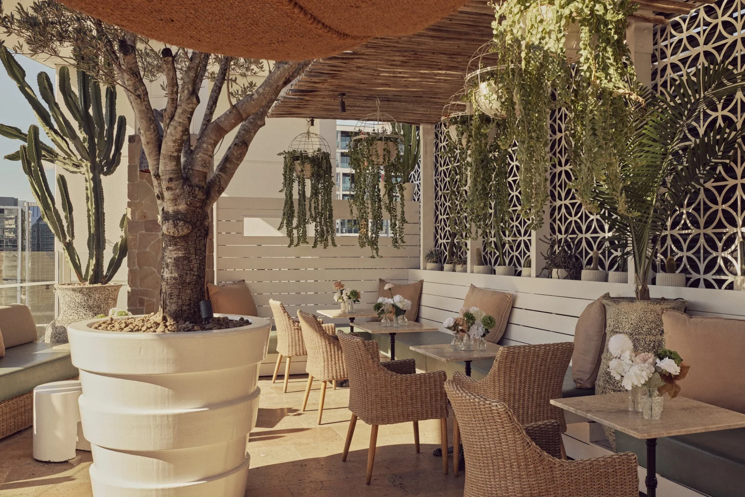 Courtyard tables at MAYA dressed with flowers