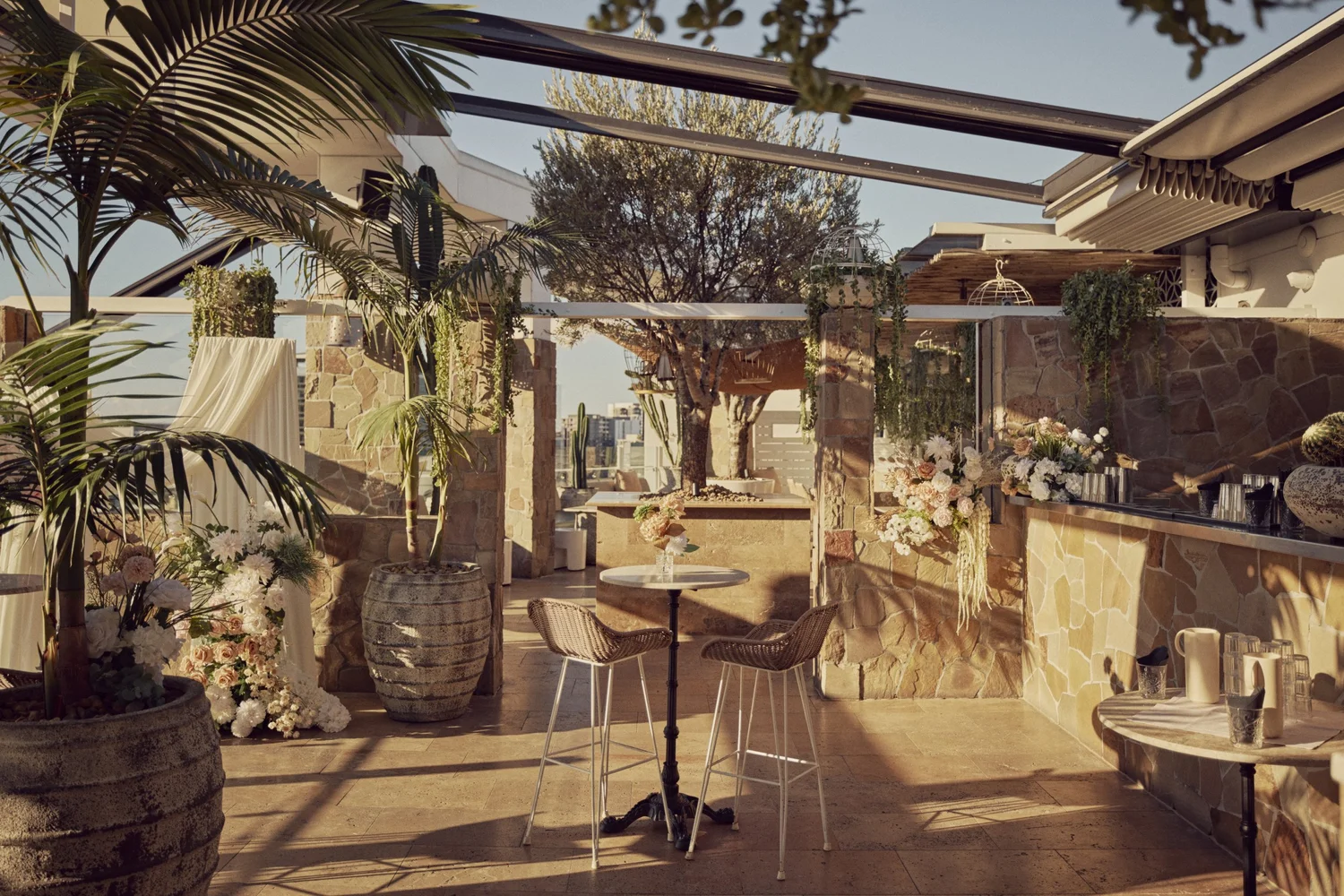 Patio Bar at MAYA styled with flowers for a private event