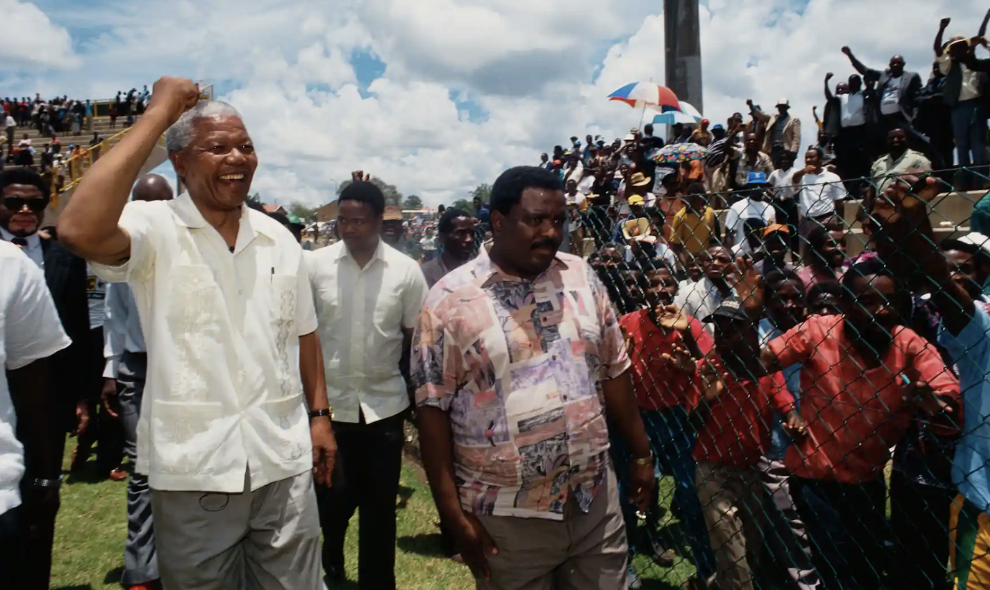  Nelson Mandela campaigns at a rally before the first democratic elections in South Africa, 1994. Photograph: Louise Gubb/Corbis/Getty Images 