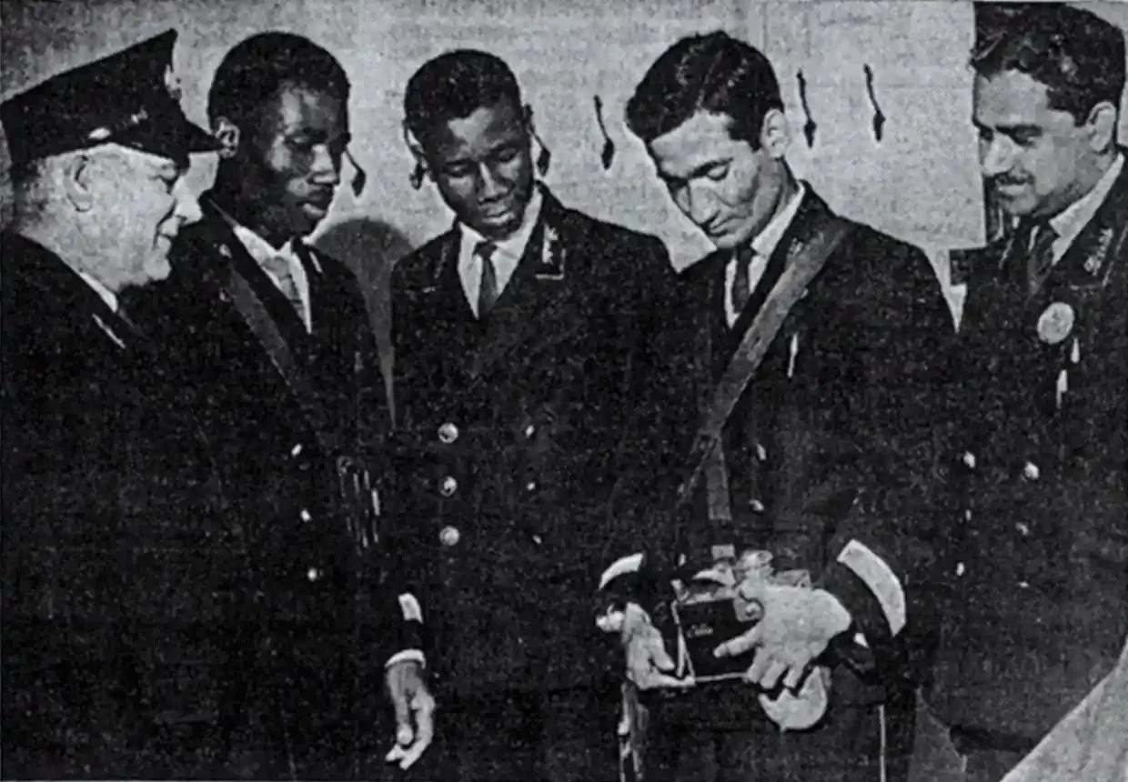  Four newly hired people of colour – (from second left) Norris Edwards, Norman Samuels, Abbas Ali and Mohammed Rashid – are trained by Frank Mills, a ticket inspector, after the abolition of the bus company’s colour bar. Photograph: Bristol Evening Post/BBC 