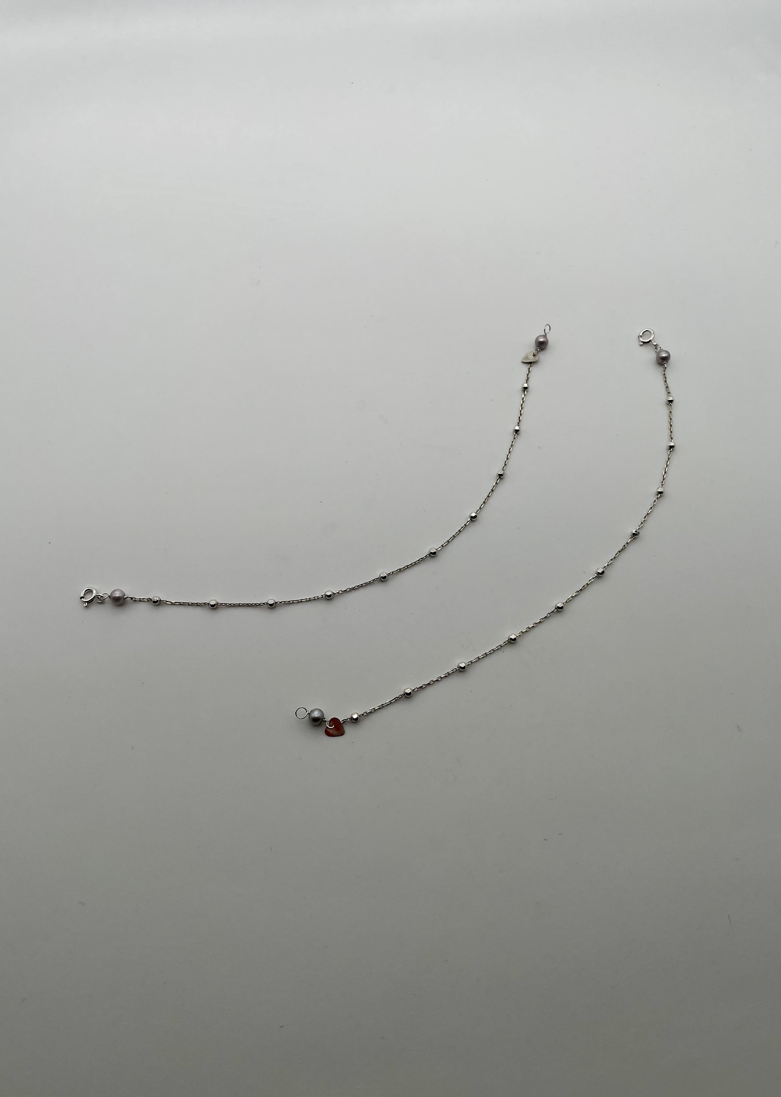 Argento 925 Perle Bianche / Grigie / Acquadolce - €25.00 cad.