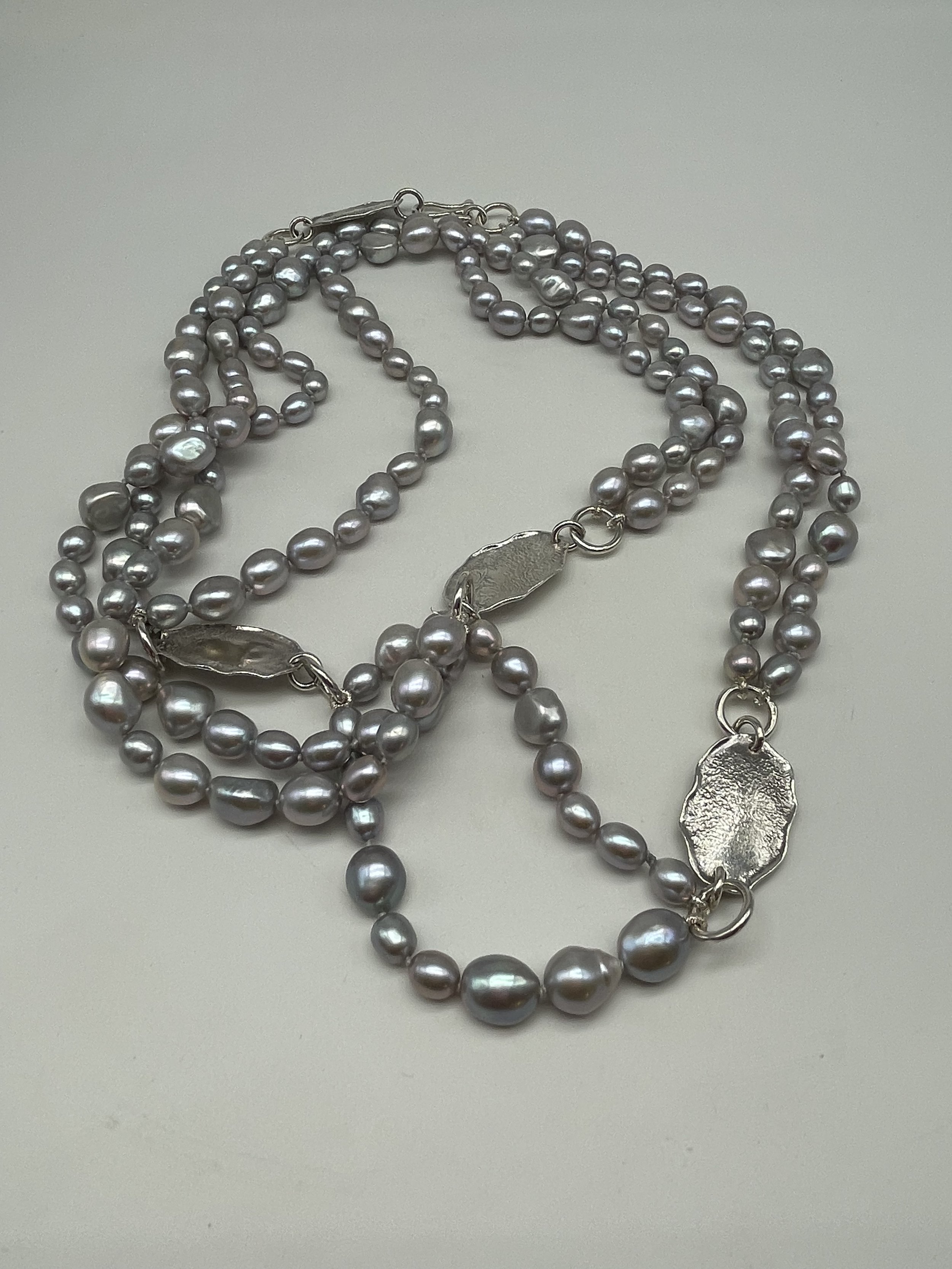 Argento 925 Perle grigie - €370.00