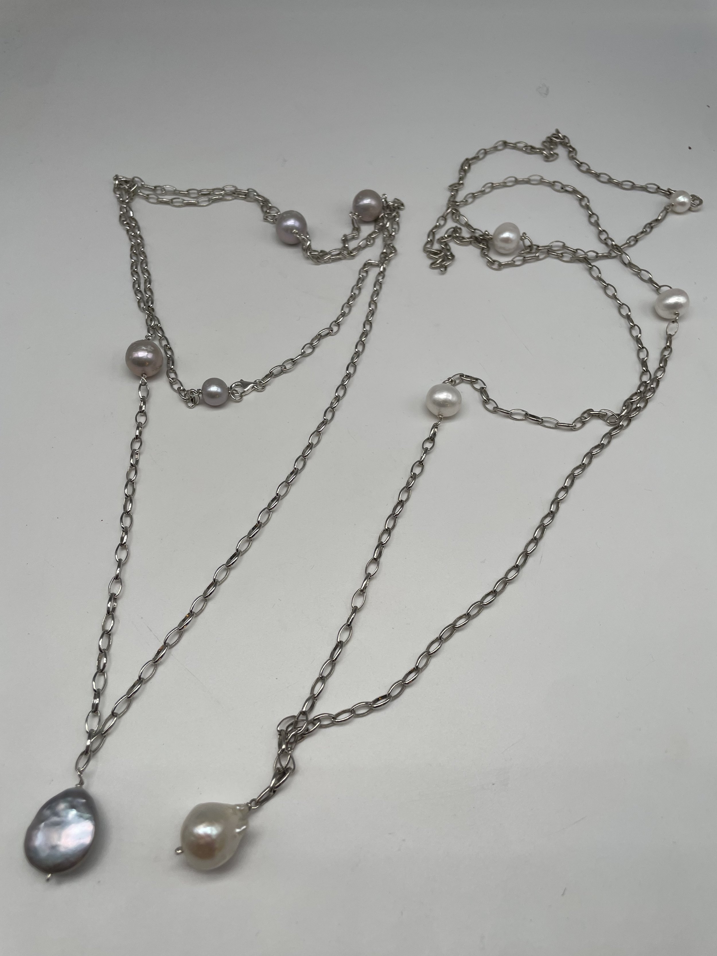 Argento 925 Perla grigia / bianca - €120.00