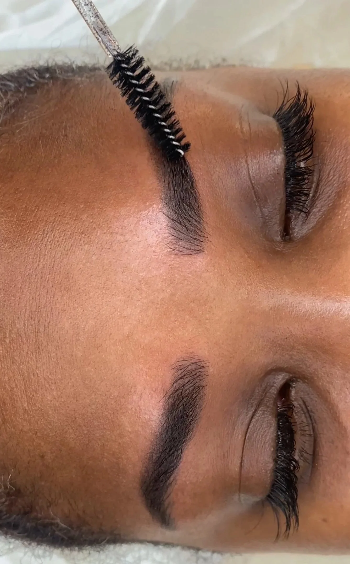 Black woman combi brows a combination of ombre brows and microblading in London Bridge