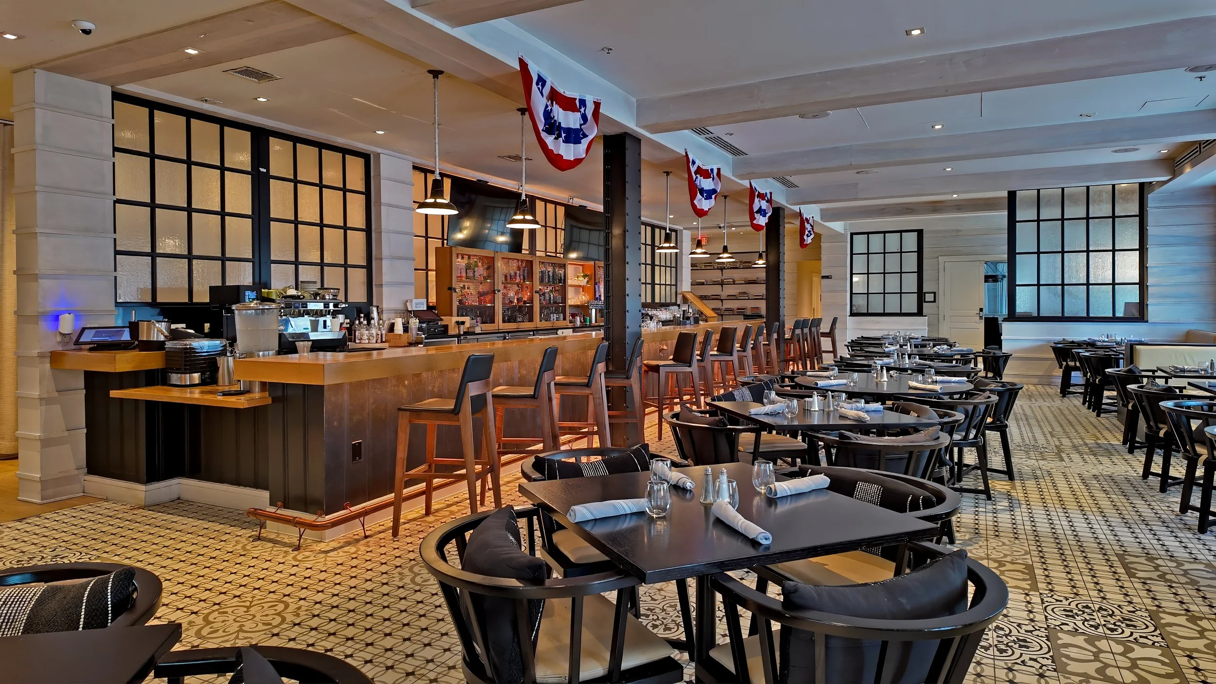 Wide view of the dining room inside Pacci Italian Kitchen at Kimpton Brice in Savannah.