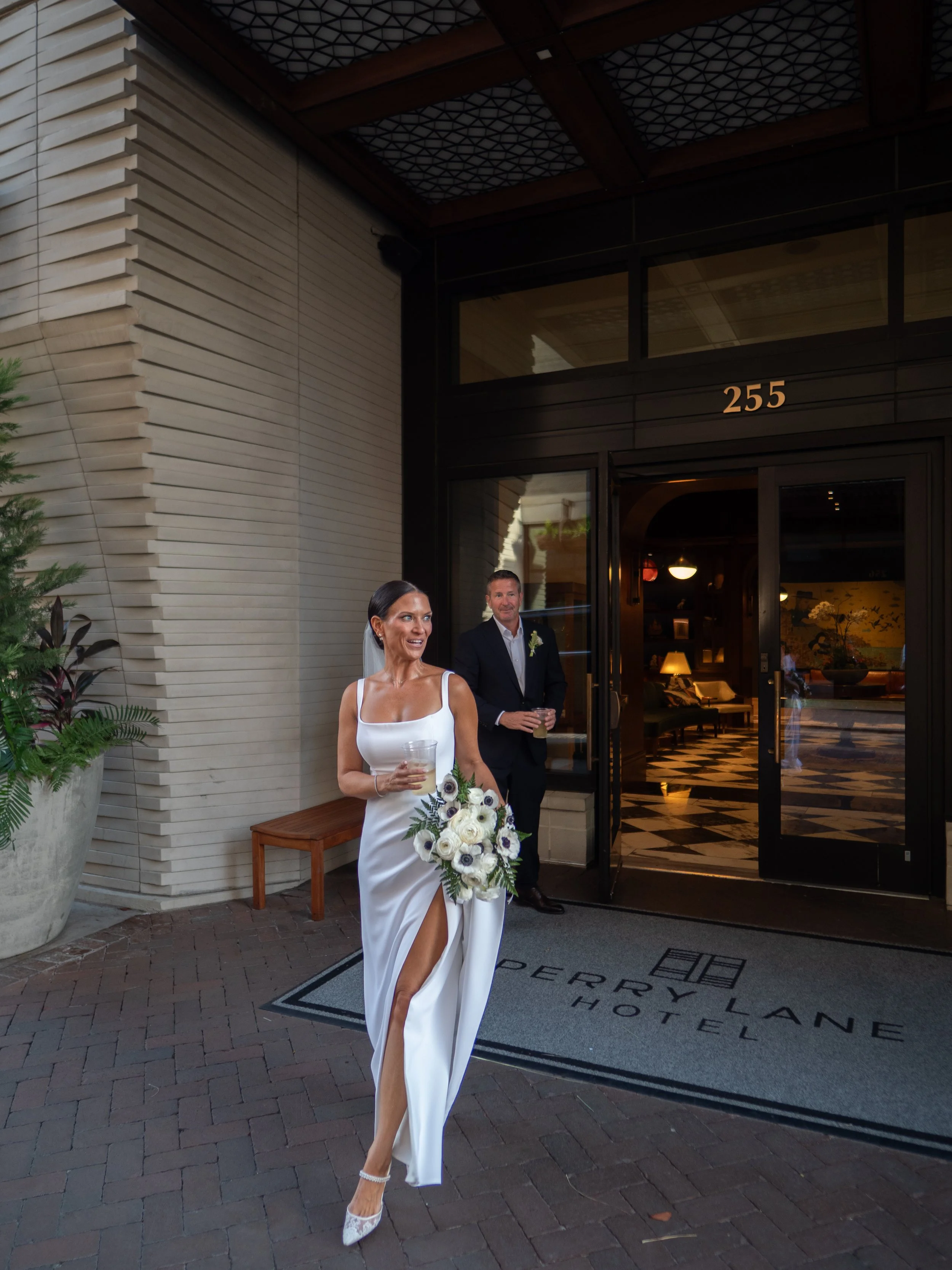 Bride and groom leaving Perry Lane Hotel for their Savannah wedding ceremony