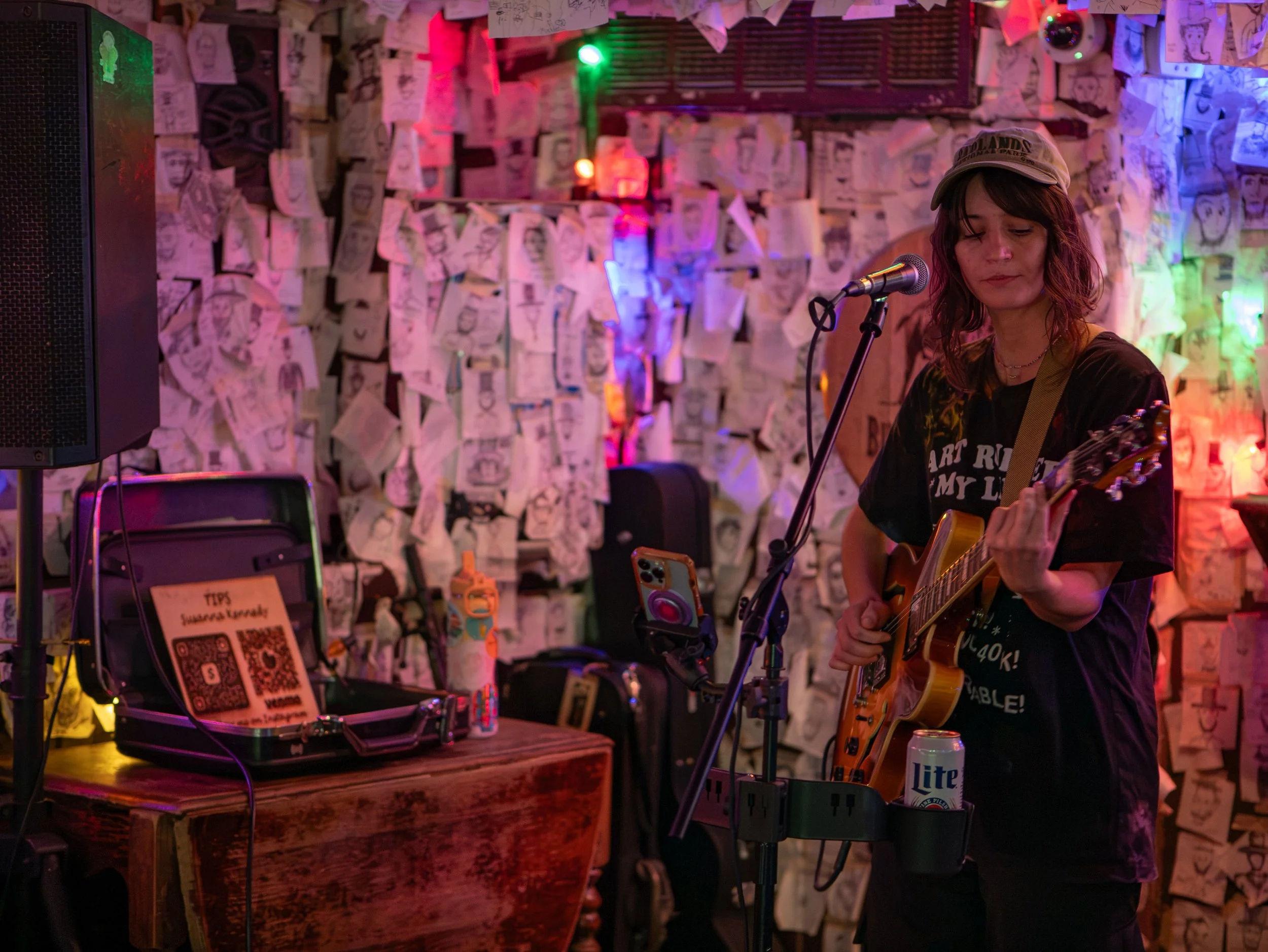 Susanna Kennedy sings and plays guitar at Abe’s on Lincoln
