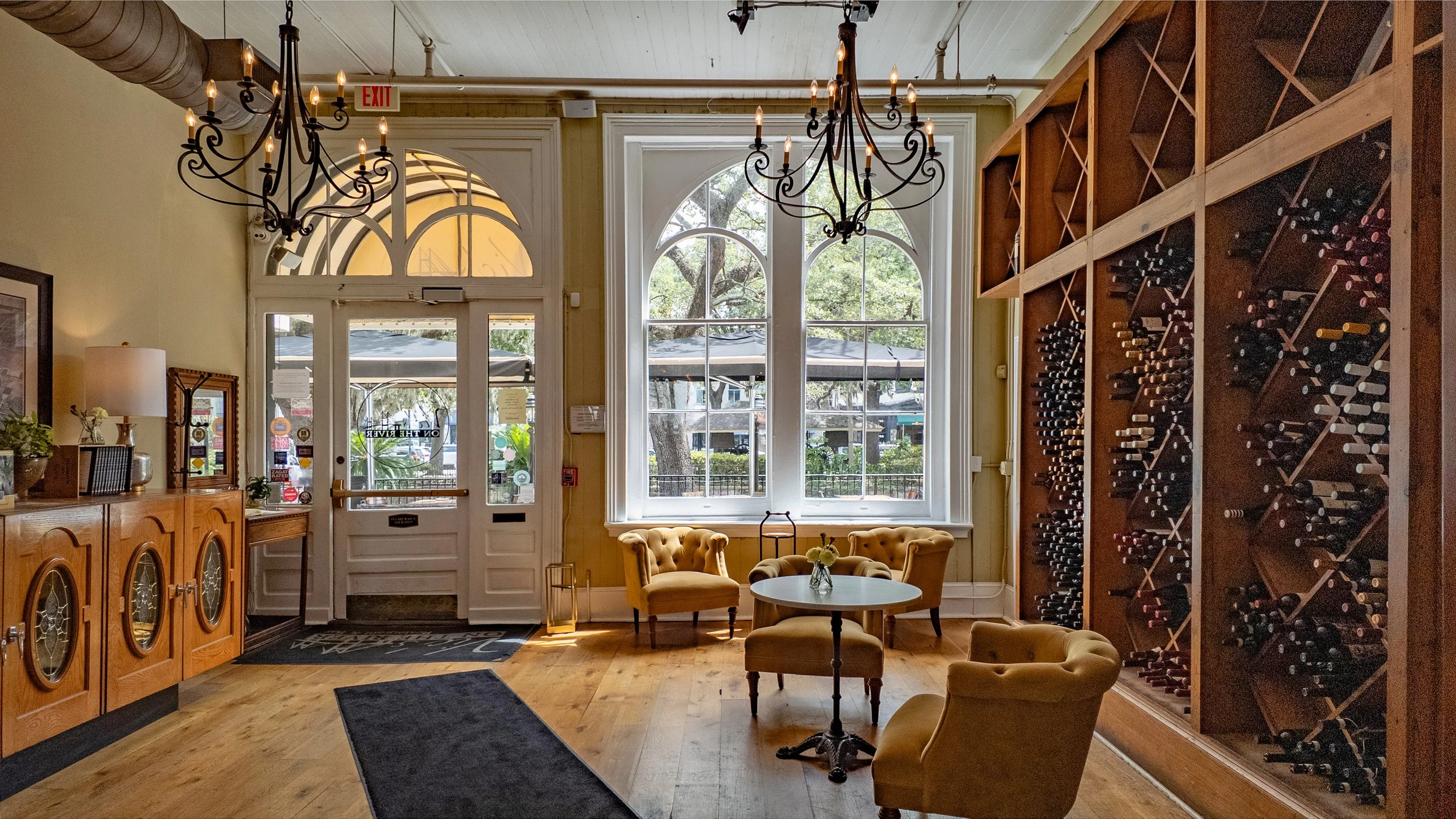 Interior dining room at Vic's on the River overlooking Savannah's historic waterfront.