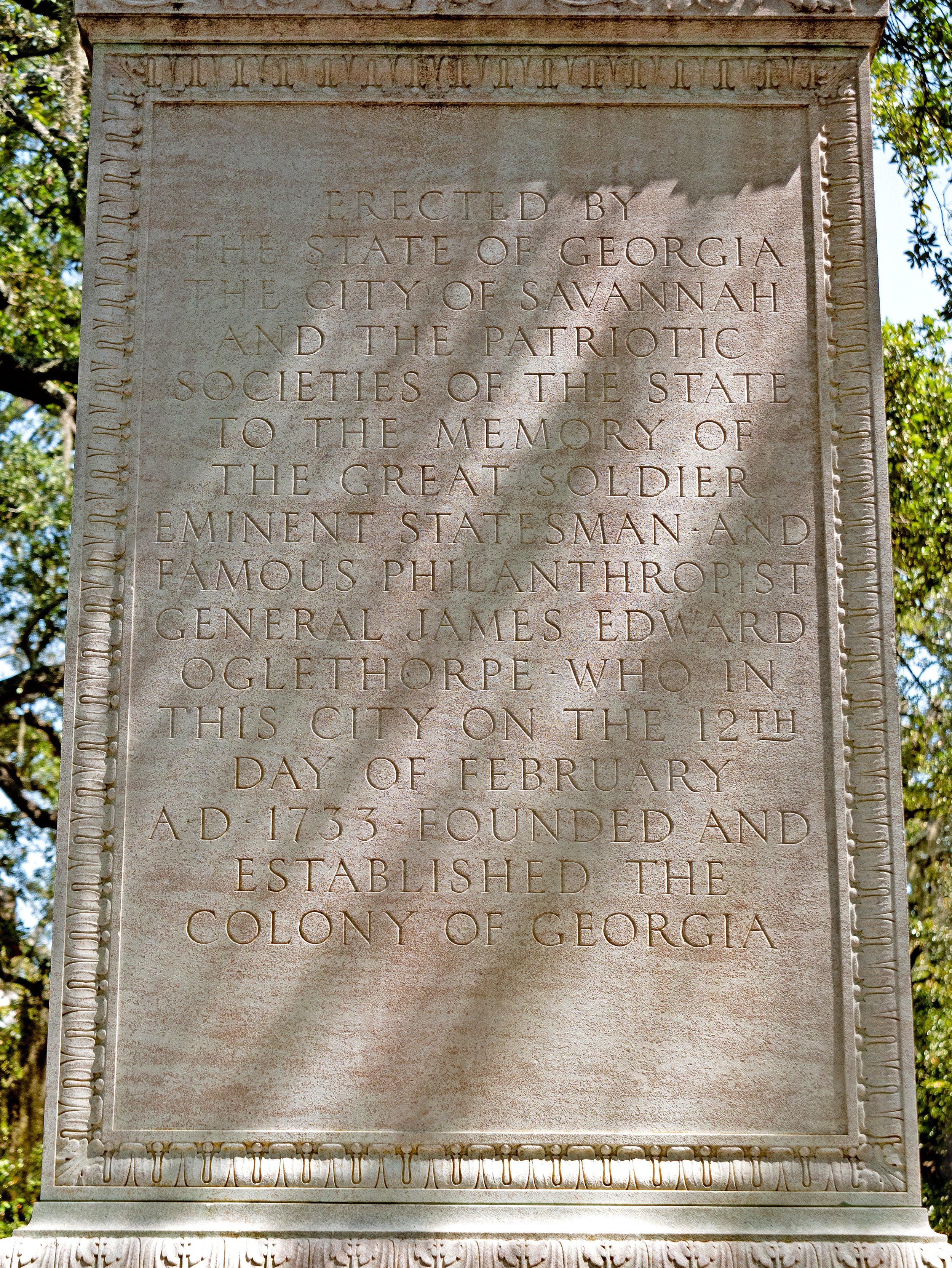 Carved dedication on the stone pedestal of the James Oglethorpe monument in Savannah.