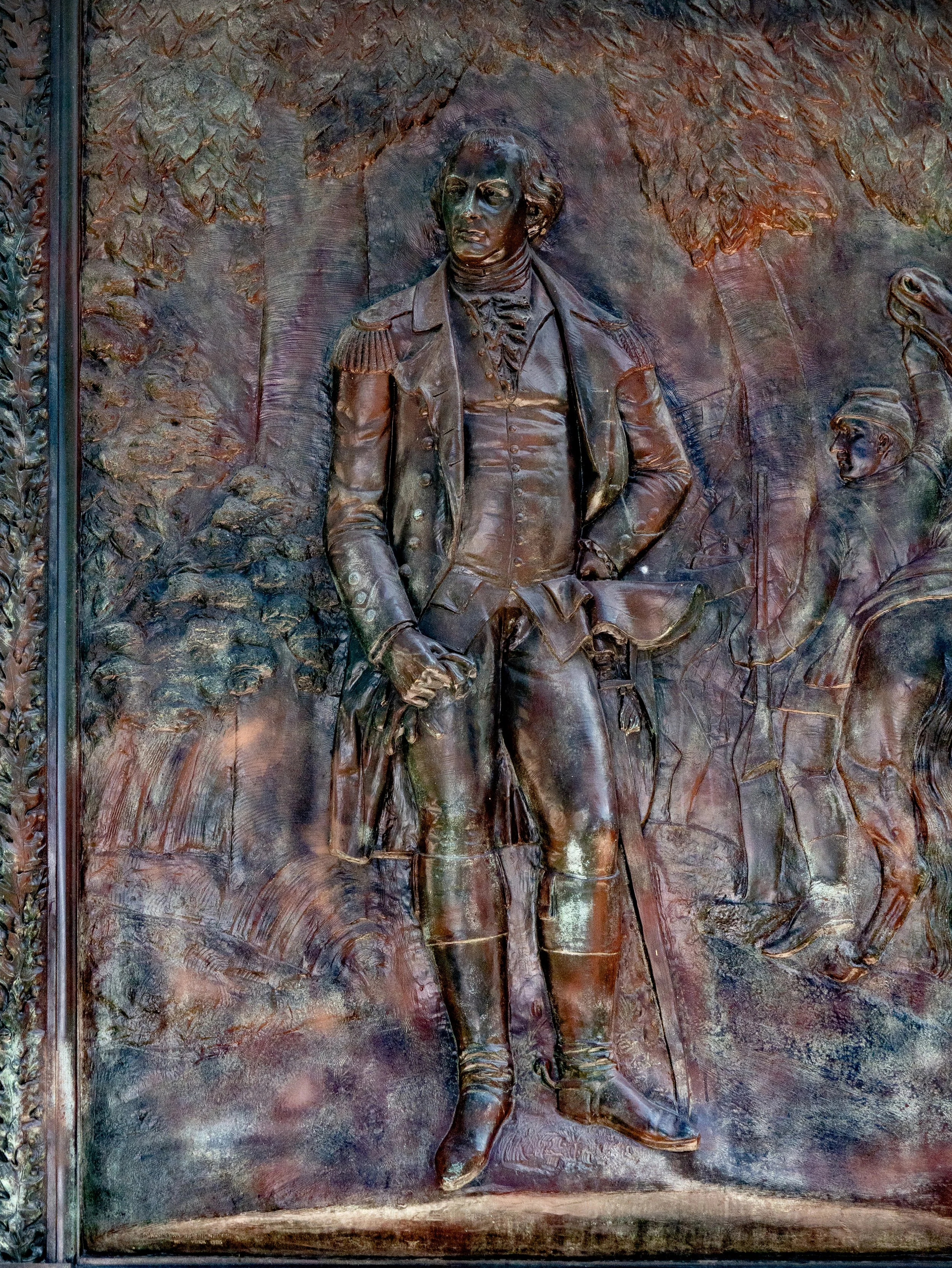 Bronze relief depicting Revolutionary War general Nathanael Greene on his Johnson Square monument.