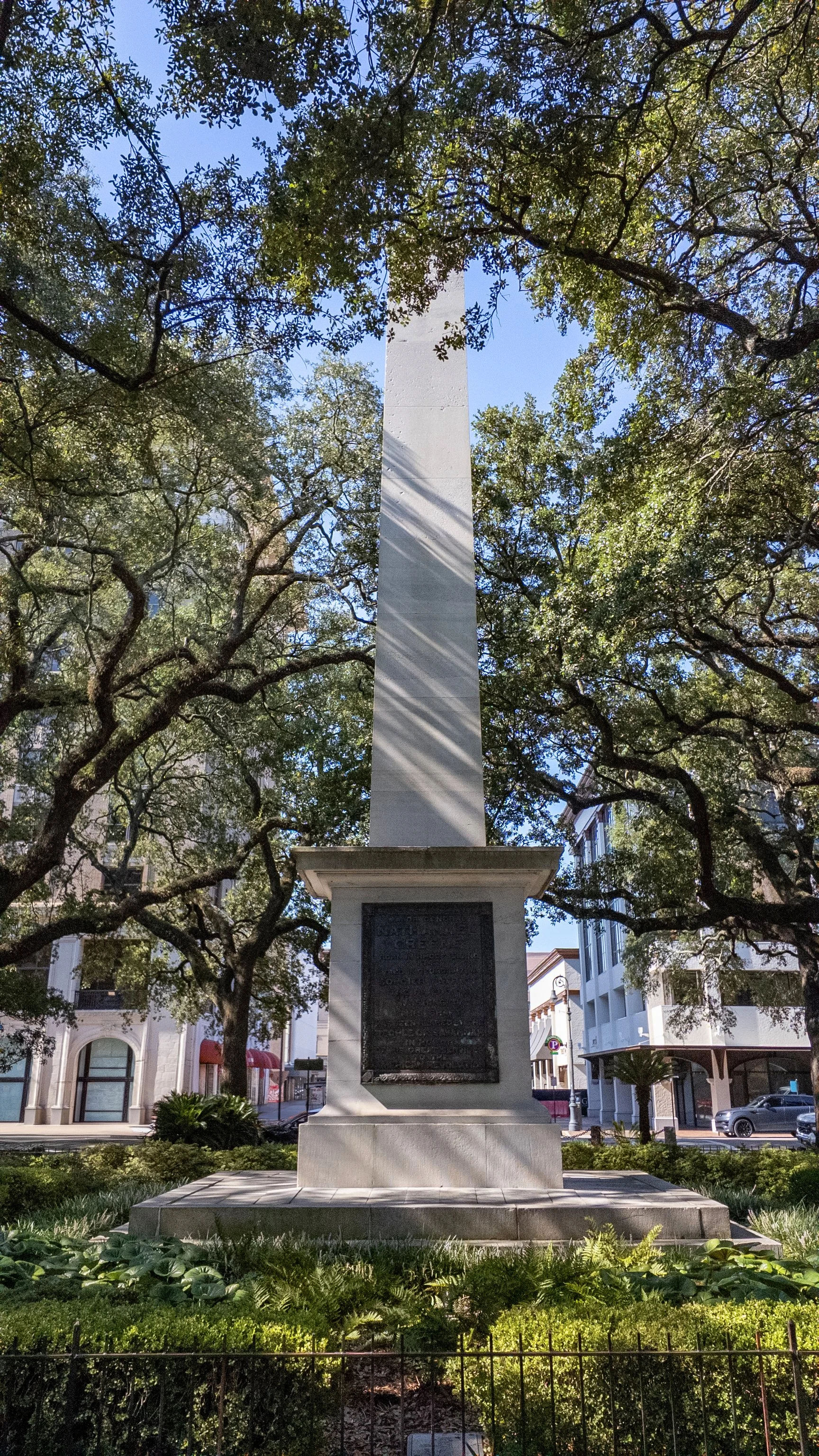 Nathanael Greene Monument rising beneath live oak trees in Johnson Square, Savannah.