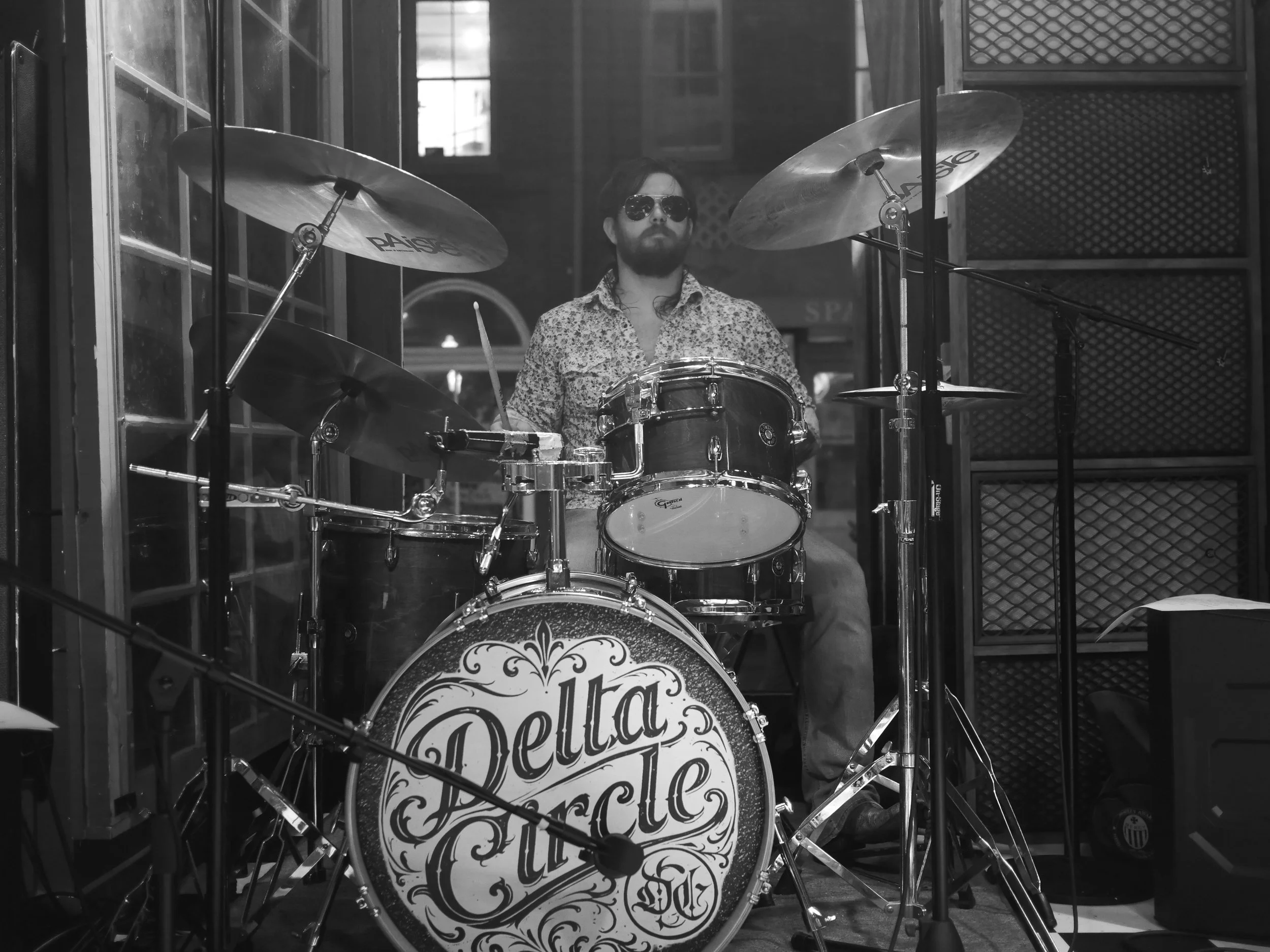 Delta Circle musician Darrell Anthony playing drums during a live performance at Honky Tonk South in Savannah.