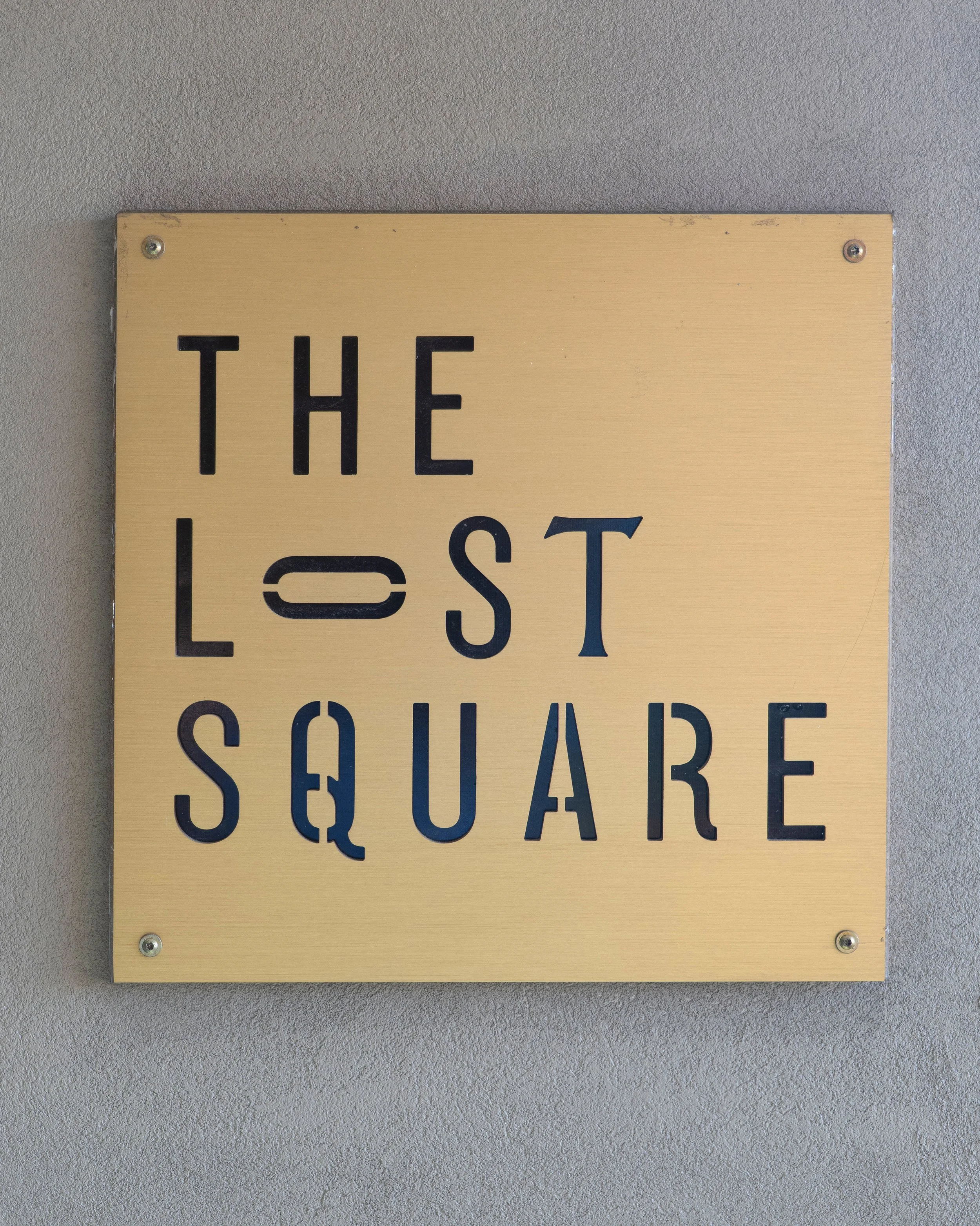 The Lost Square plaque marks the entrance to The Lost Square rooftop bar at The Alida Hotel in Savannah, Georgia.