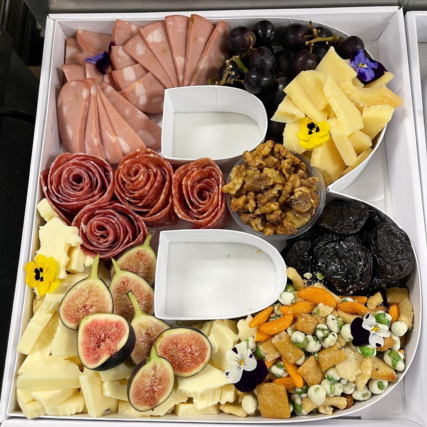 A client came in with a custom charcuterie request and of course we accommodated. These fun charcuterie filled letters for graduation were a huge hit! No matter what your catering needs are, we can accommodate.

Call or email today!
 
(203)-269-9266

