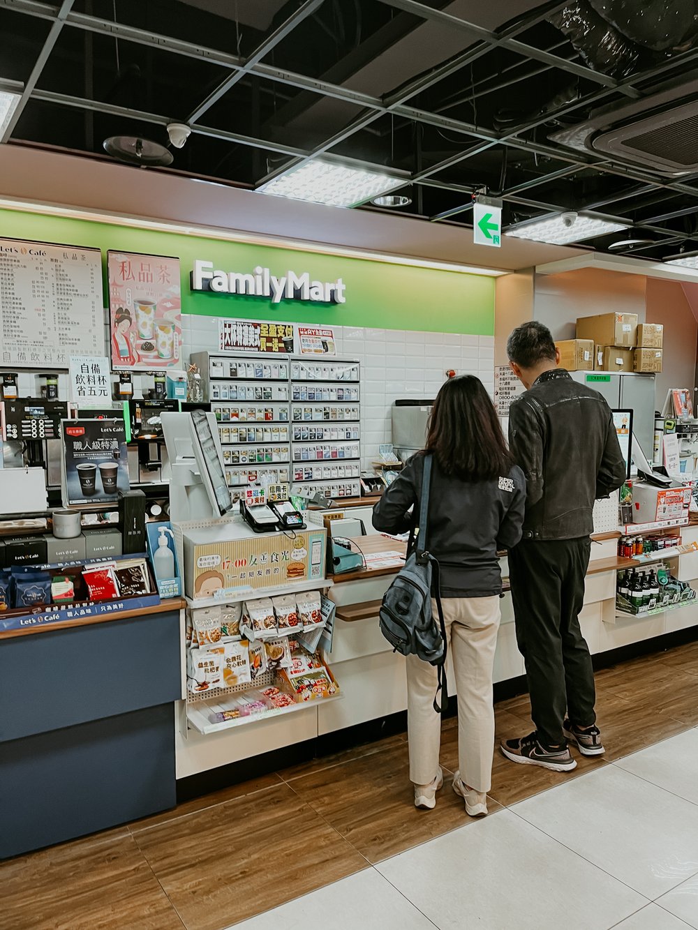  parents paying their utilities at FamilyMart 