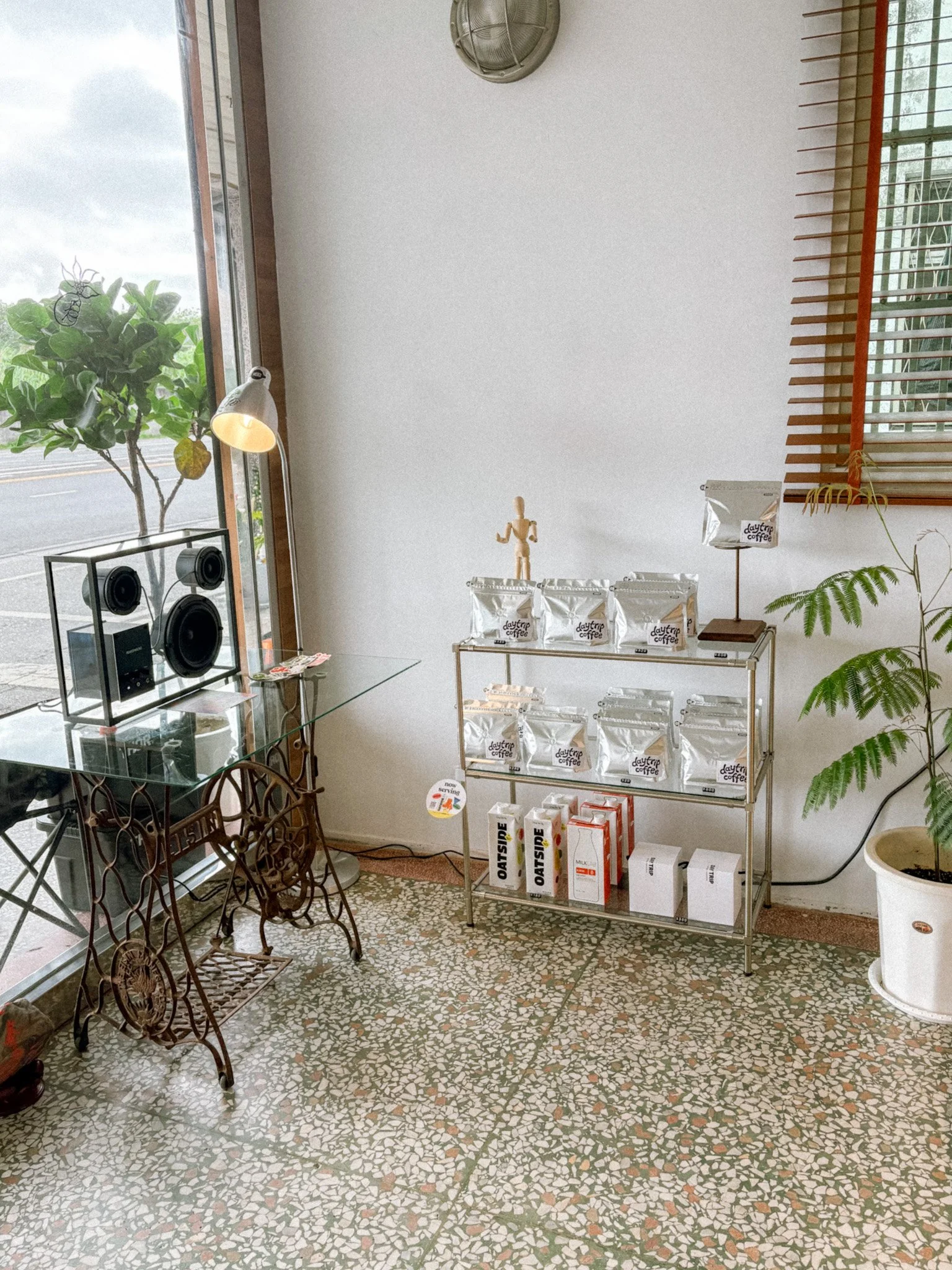Coffee beans and glass speakers at Daytrip Coffee Roasters, specialty cafe in Hualien