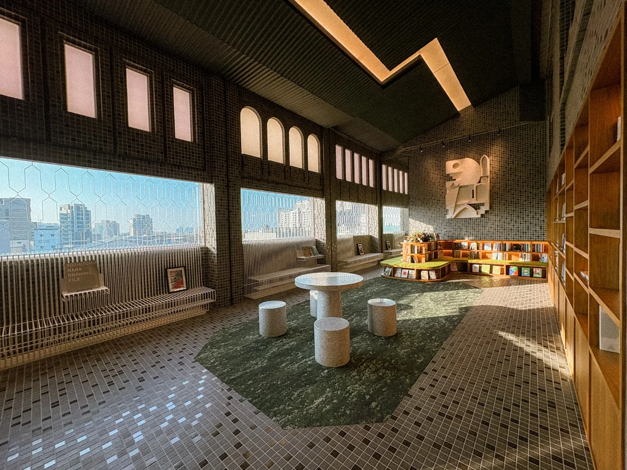 8th floor library at Provintia Hotel Tainan with retro tile walls and Tainan city views