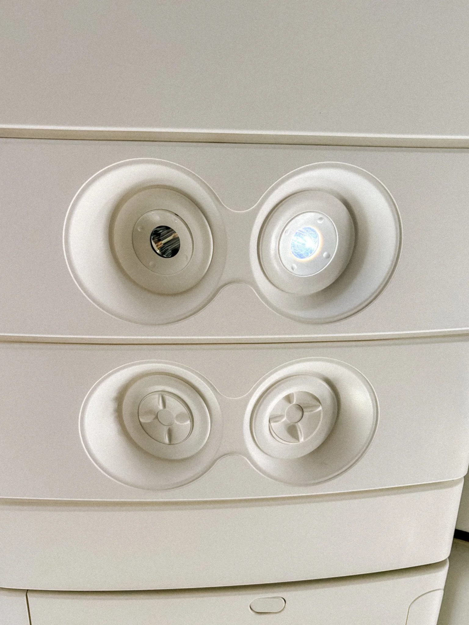 Air vent and overhead reading lights above Norse Atlantic Premium Economy seats