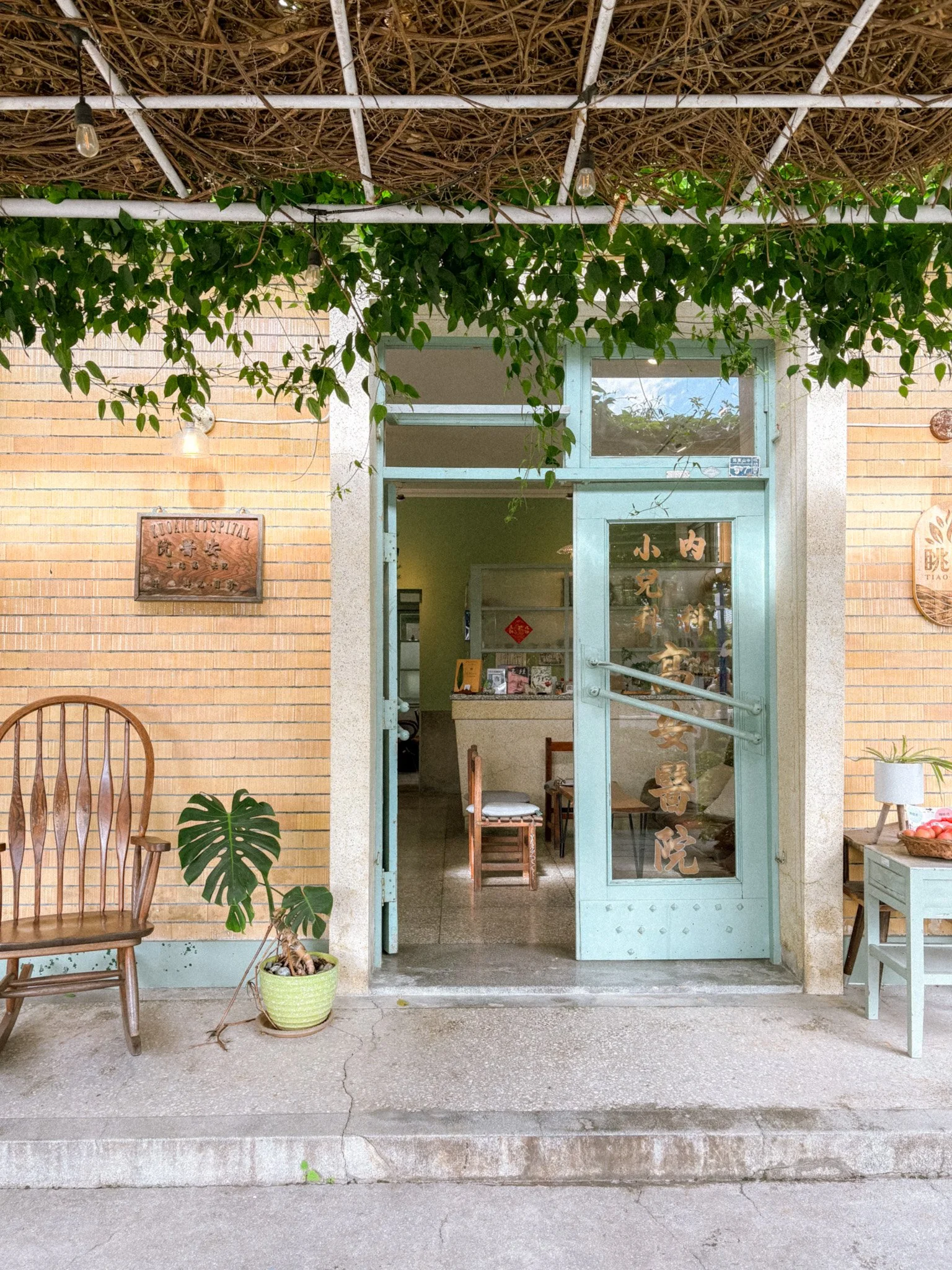 iaoGang Cafe entrance in Taitung with iconic blue hospital door, a unique historic building turned cafe