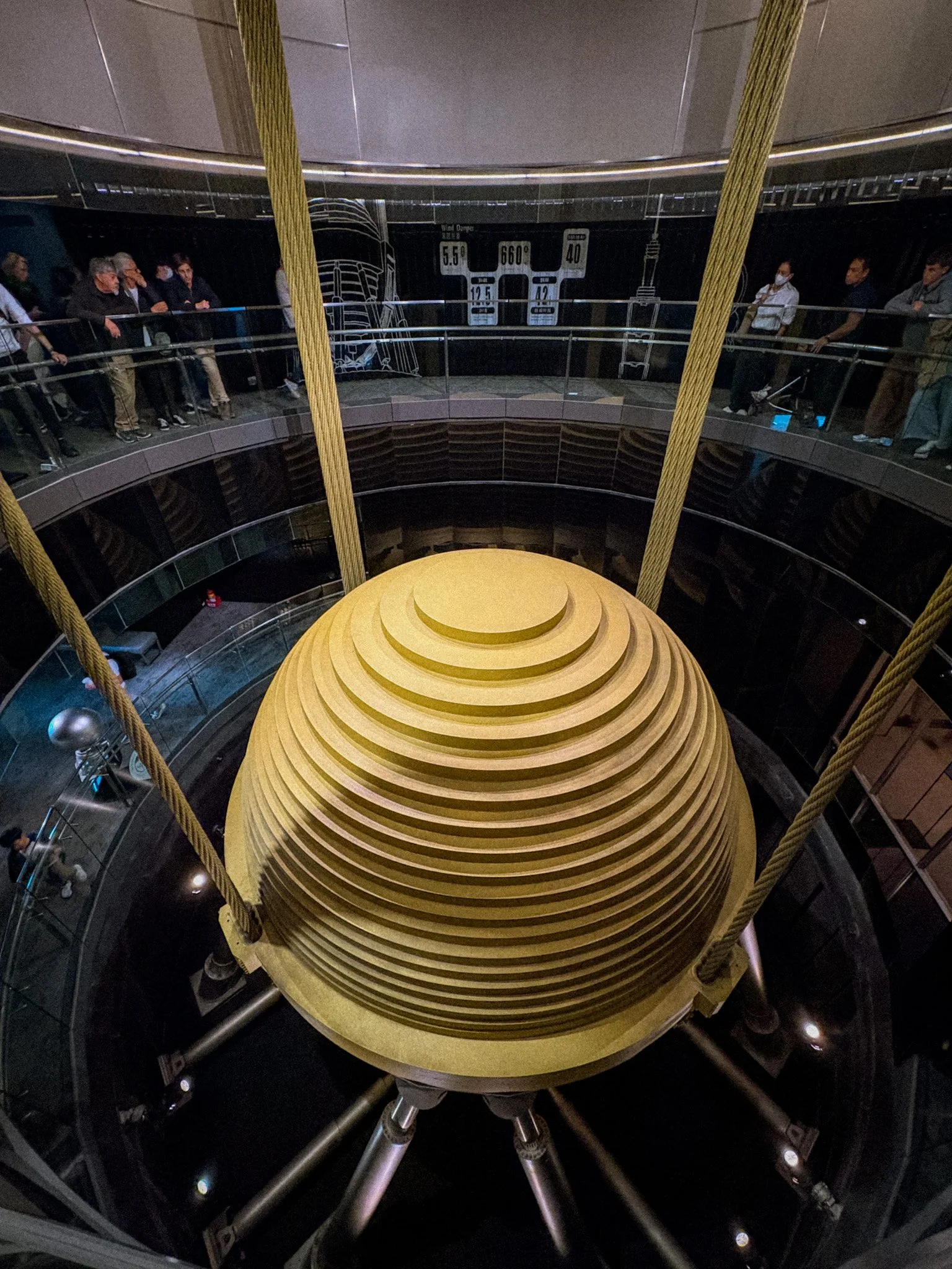 660-tonne tuned mass damper ball inside Taipei 101 used to stabilize the building during earthquakes and typhoons