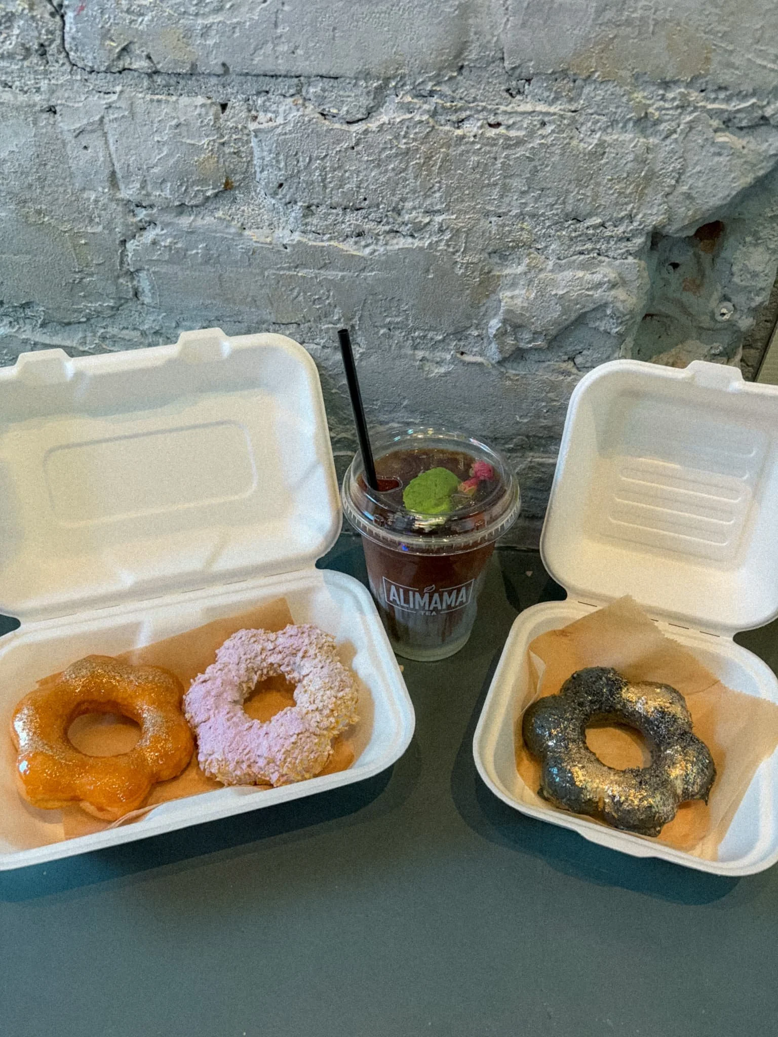 Three mochi donuts and an iced tea from Alimama