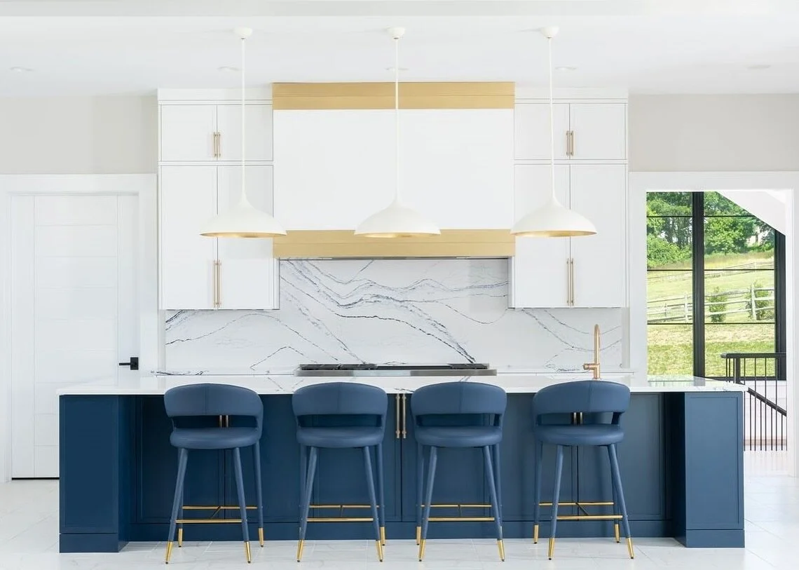Island ✨✨✨
.
.
.
This massive island is the perfect fit for a large family who loved to cook! The pop of gold brings such warmth to a white and blue kitchen design! 
.
.
.
#kitchen 
#kitchendesign 
#design 
#newbuild 
#newconstruction 
#whiteandblue 