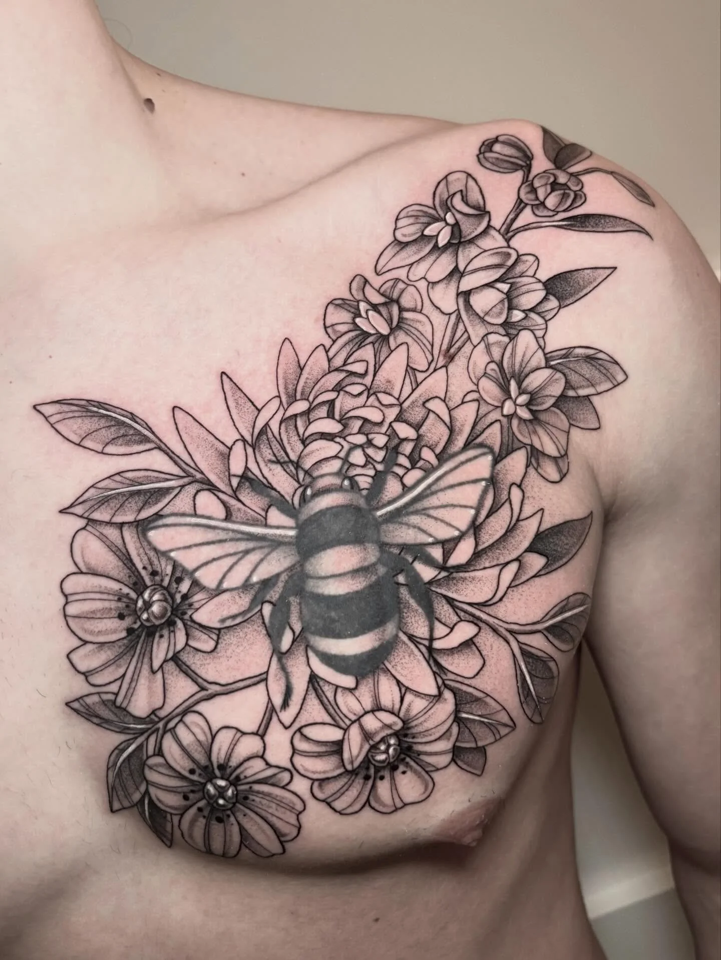 Added some flowers around this little bee I did couple years back when I was a little baby tattooer! Thank you for the trust ☺️&hearts;️
.
.
.
.
.
#sacredarttattooct #cttattooartist #beetattoo #flowertattoo #chesttattoo