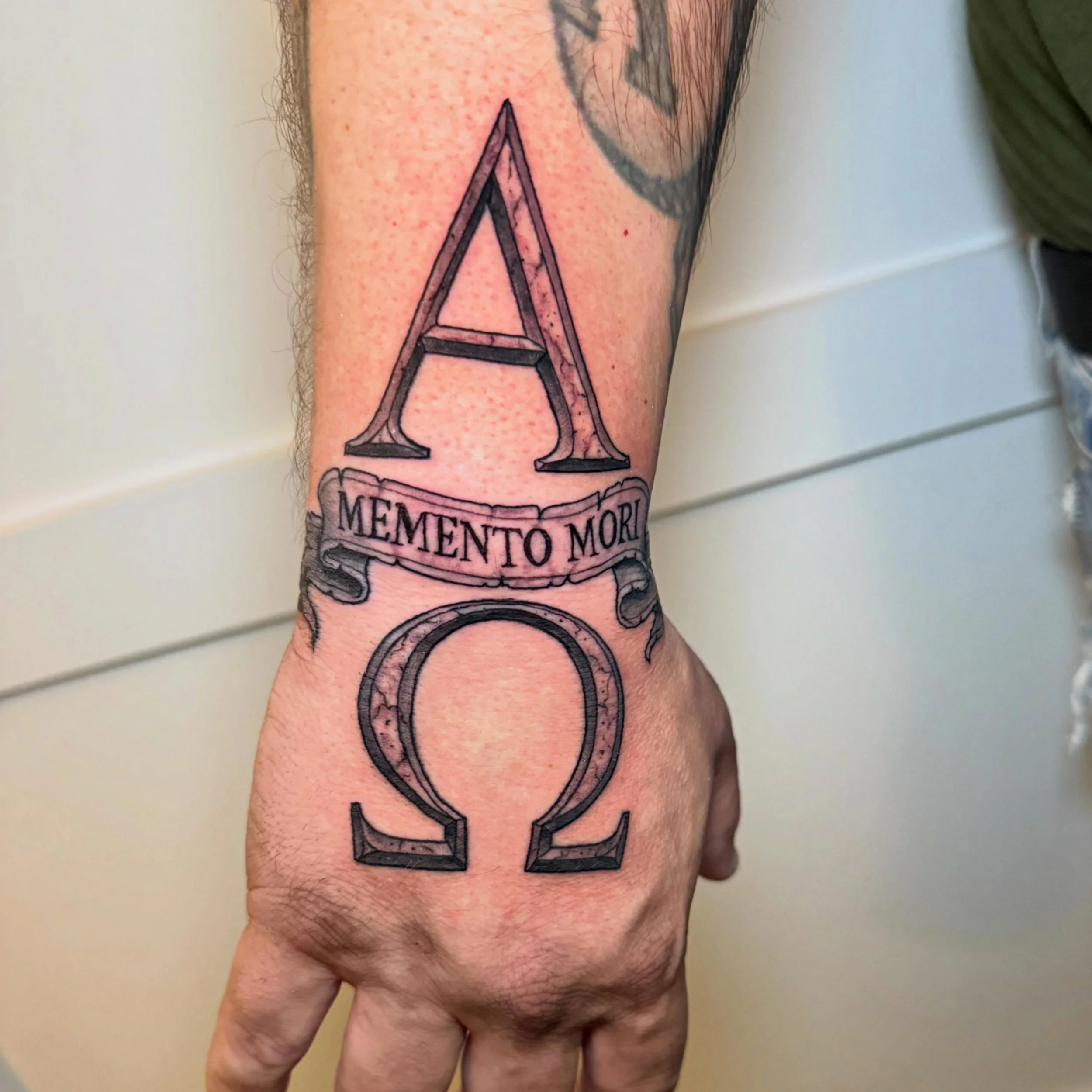 My client yesterday enjoyed his hand tattoo so much he came back today for seconds! 
.
.
.
#sacredarttattooct  #ctink #inked #connecticuttattoos #blackandgreytattoo