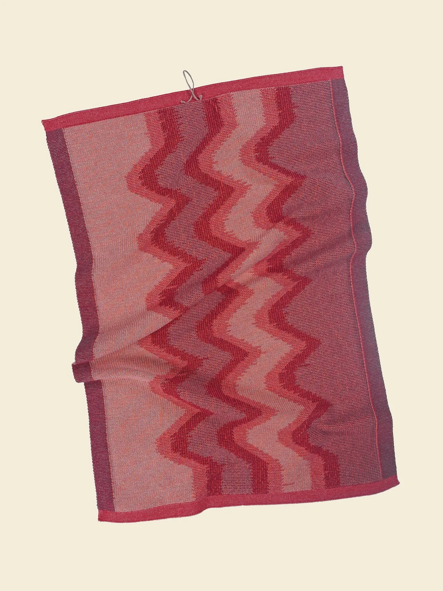 A set of 2 sustainable knitted kitchen towels made from organic cotton. Shop at www.boi-knit.com

Inspired by woven ikat textiles, it embraces imprecise graphics for a unique, artistic look. The special weave-in technique adds stability to the towel,