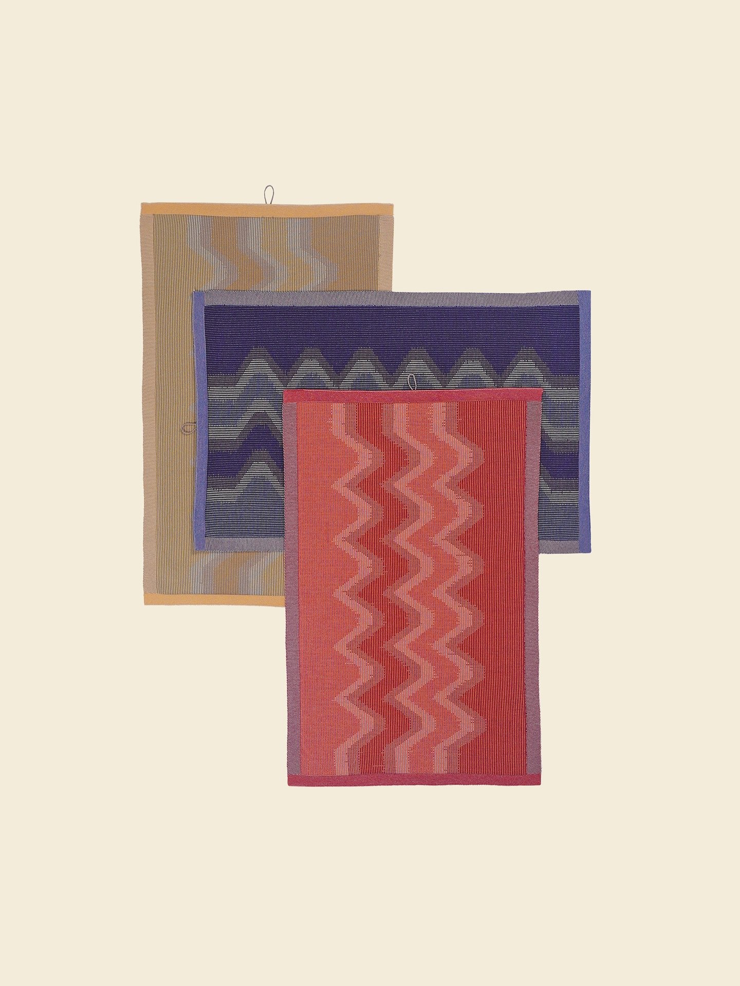 A set of three organic cotton kitchen towels. Shop at www.boi-knit.com

Inspired by woven ikat textiles, it embraces imprecise graphics for a unique, artistic look. The special weave-in technique adds stability to the towel, making It durable for cou