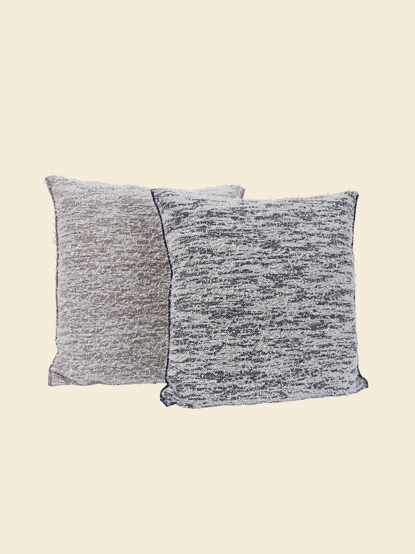 Fuzzy pillowcase in beige and navy. Shop at www.boi-knit.com

This pillowcase with uneven surface celebrates artistic expression and invites to touch and curiosity. It is knitted directly in form, while combining knitting and weaving in one product. 